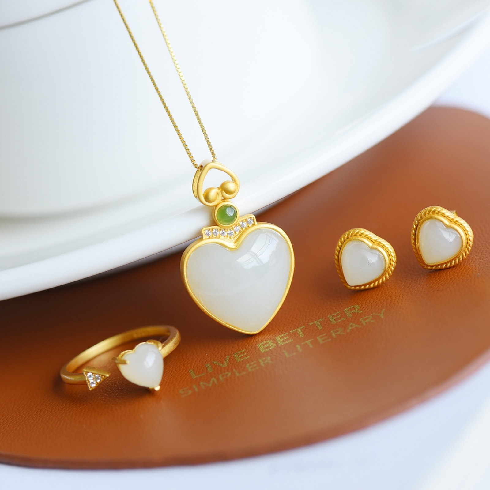 A Set of Fine Sterling Silver-Gold Plated Inlaid White Jade Jewelries: A Set of Exquisite Sterling Silver-Gold Plated Inlaid White Jade Jewelry , Size :0.6inx0.7in,0.3inx0.3in,0.3inx0.3in 一套纯银镀金镶白玉首