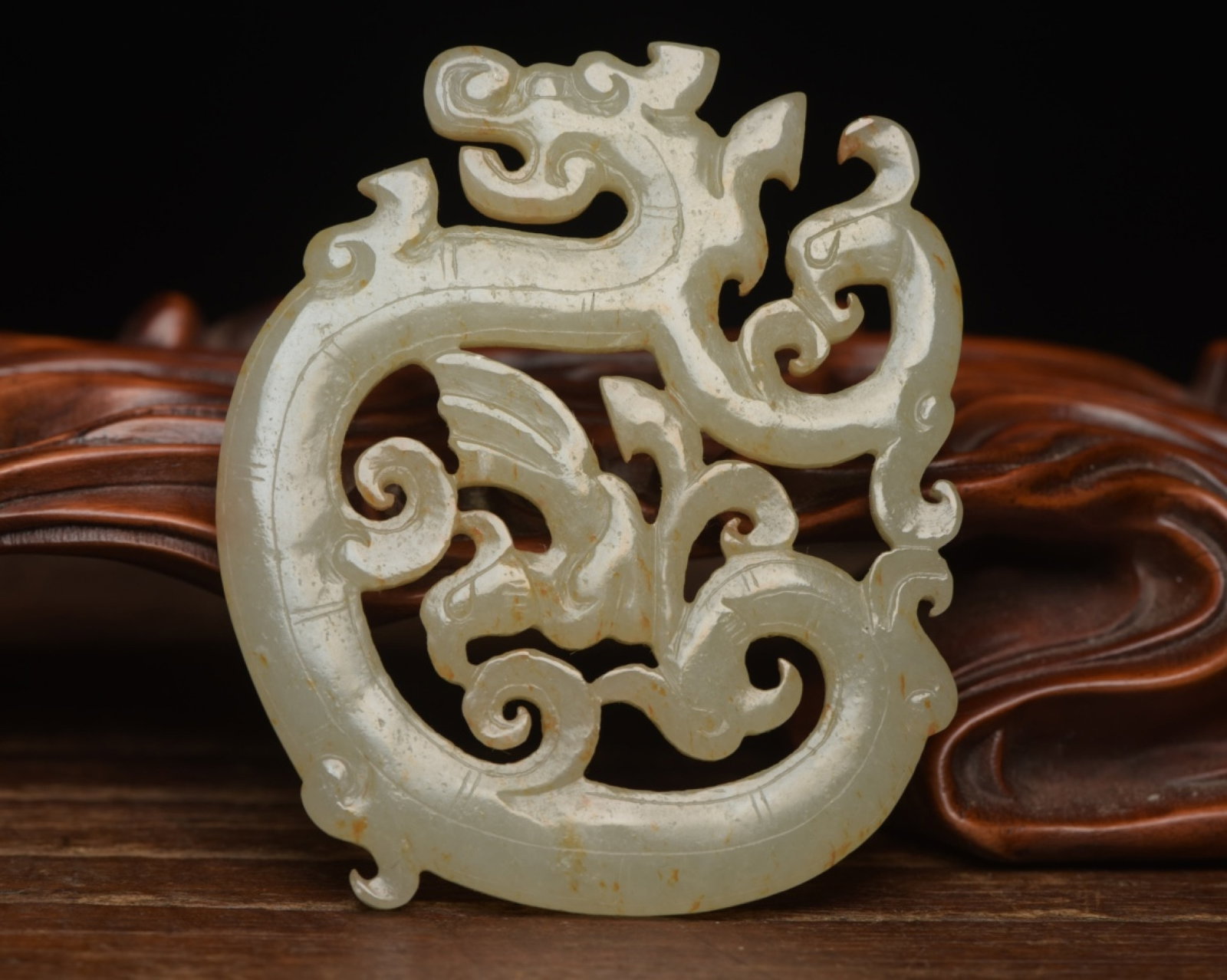 An Exquisite White Jade Dragon and Phoenix Pendant: An Exquisite White Jade Dragon and Phoenix Pendant,Qing Dynasty,China,Size:2.6inx2.2inx0.2in,Weight:37g 白玉龙凤佩,中国清代