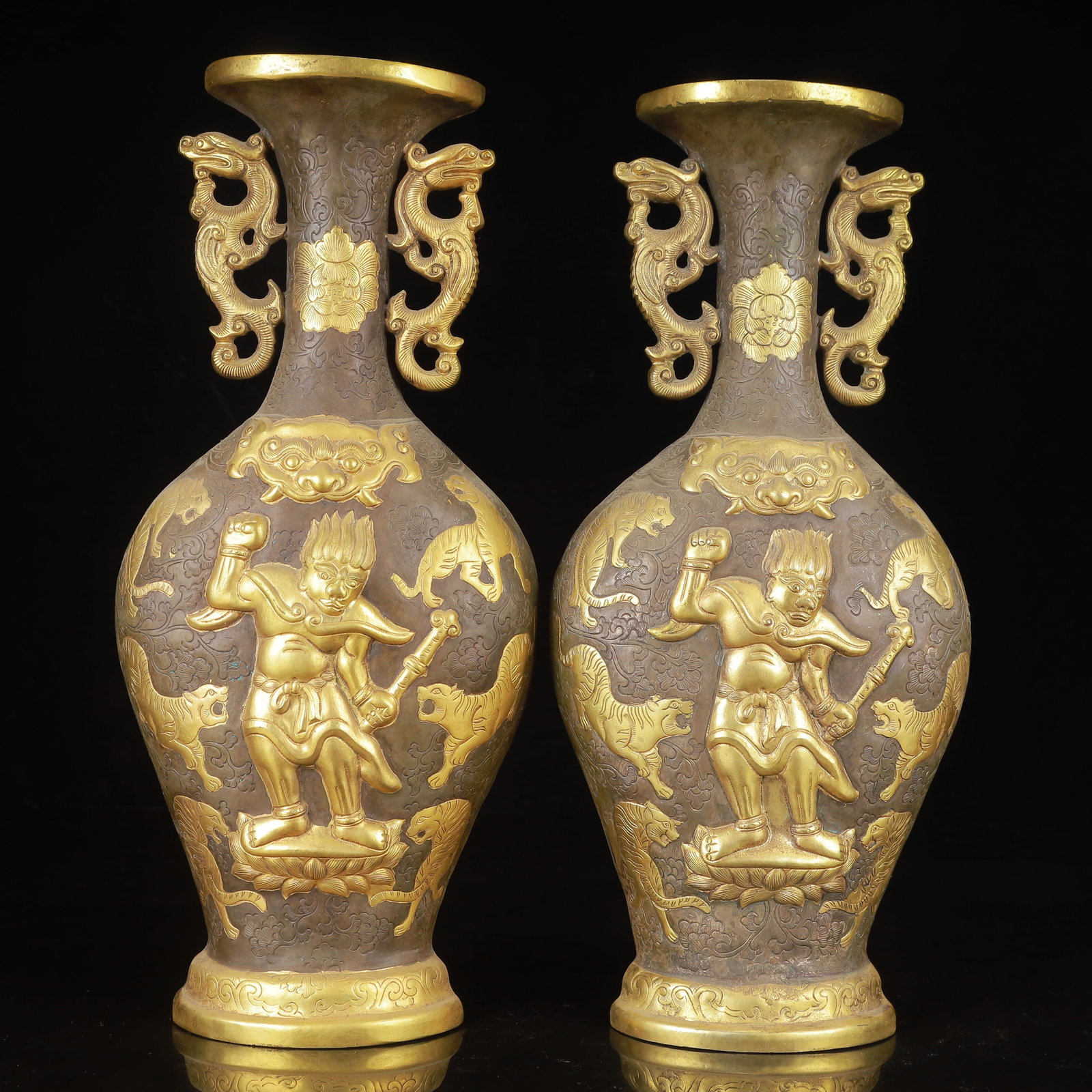 A Pair of Exquisite Gilt Silver Figure and Auspicious Beast Pattern Dragon-Ears Vases: A Pair of Exquisite Gilt Silver Figure and Auspicious Beast Pattern Dragon-Ears Vases,Qing Dynasty,China,Size:5.5inx3inx12.2inx2,Weight:2200g 一对银鎏金人物&#