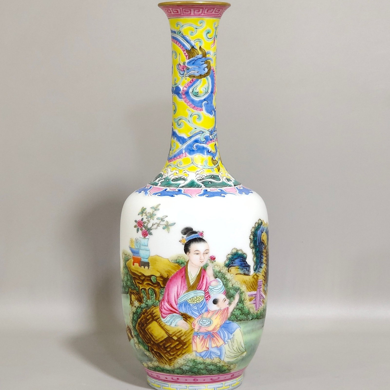 An Exquisite Enamel Painted Gold Figure and Dragon Pattern Vase: An Exquisite Enamel Painted Gold Figure and Dragon Pattern Vase,Qing Dynasty,China,Qianlong Four-character Mark,Size:8.7inx3.3in 珐琅彩描金人物龙纹