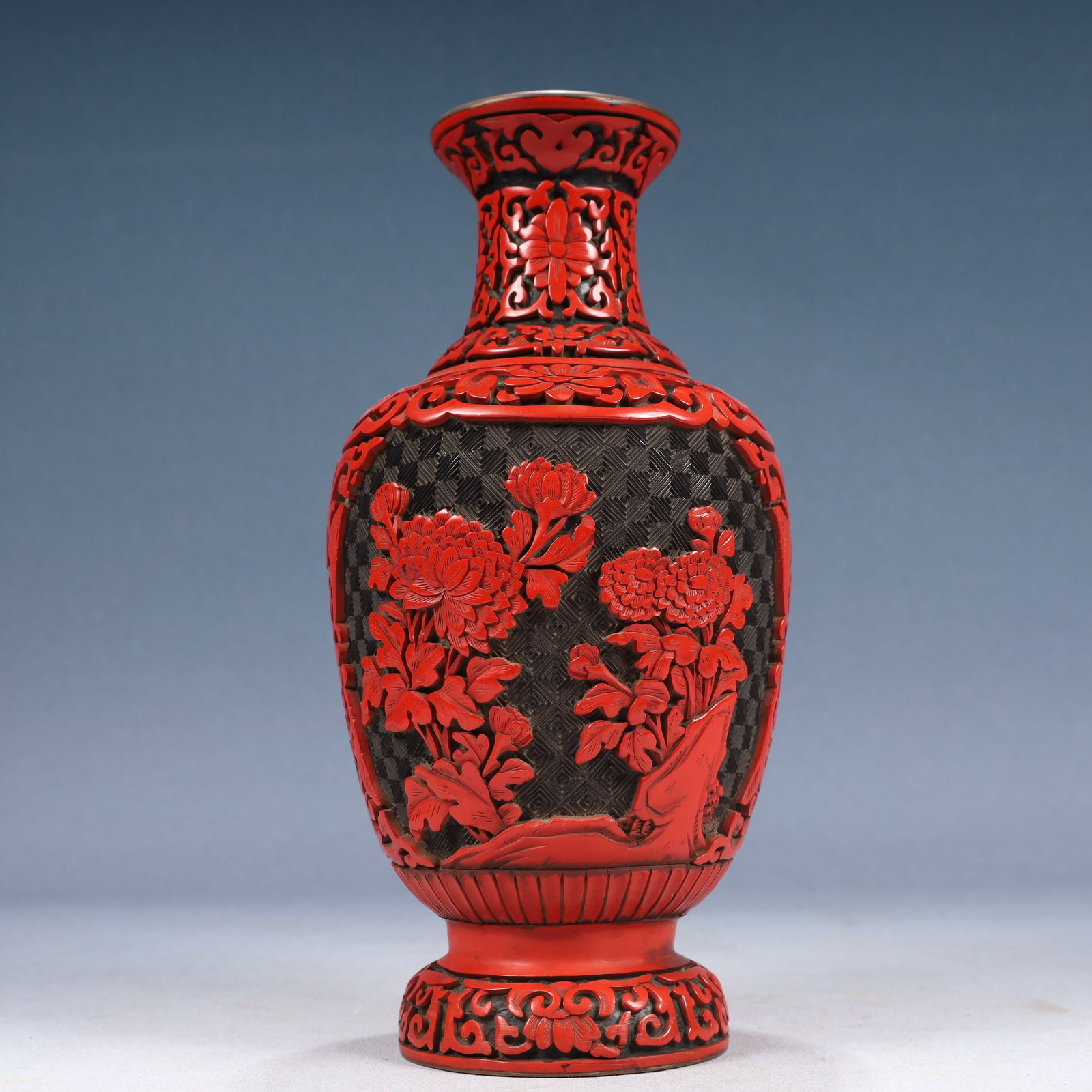 An Exquisite Carved Red Lacquer Flower Pattern Vase: An Exquisite Carved Red Lacquer Flower Pattern Vase,Qing Dynasty, China,Size:4.7inx10.2in,Weight:650g 剔红漆花卉纹瓶,中国清代
