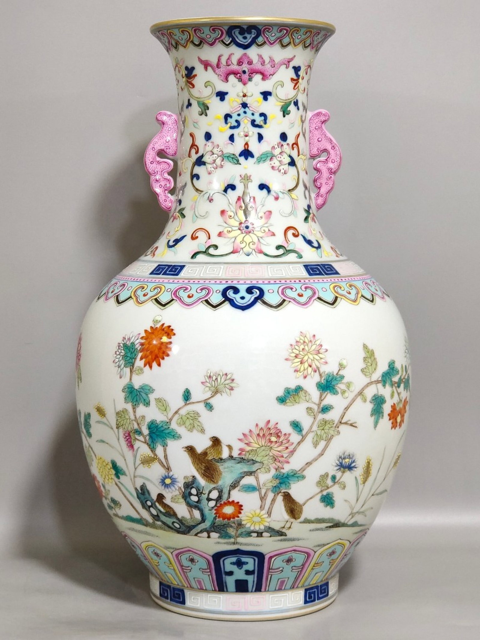 A Rare Famille-Rose Painted Gold Flower and Bird Pattern Double-Ears Vase: A Rare Famille-Rose Painted Gold Flower and Bird Pattern Double-Ears Vase,Qing Dynasty,China,Qianlong Six-character Mark,Size:13inx7.3in