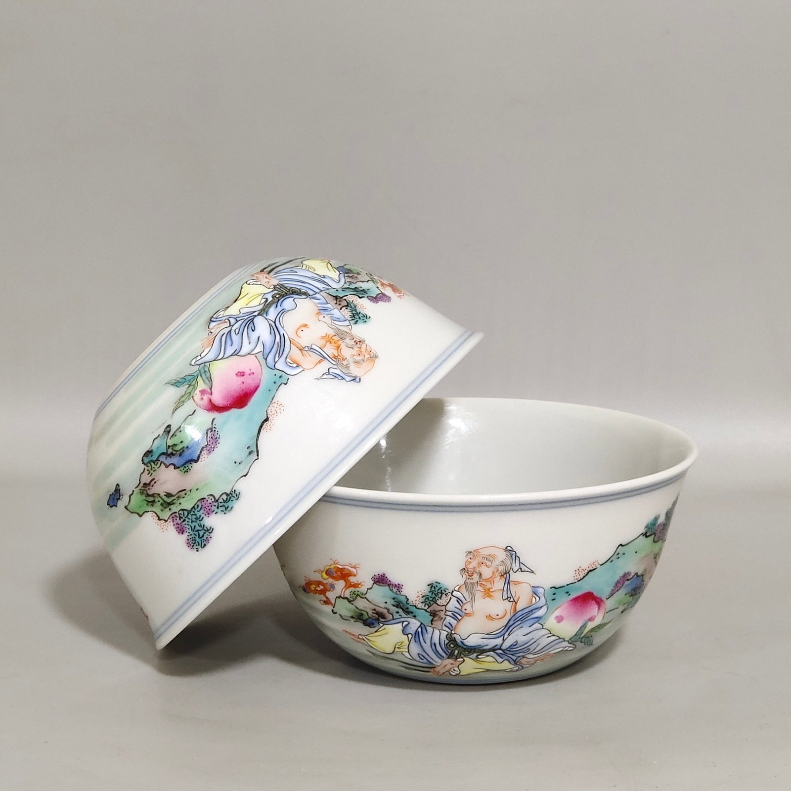A Pair of Exquisite Famille-Rose Seawater Figure Pattern Cups: A Pair of Exquisite Famille-Rose Seawater Figure Pattern Cups,Qing Dynasty,China,Yongzheng Six-character Mark,Size:1.7inx3.5in