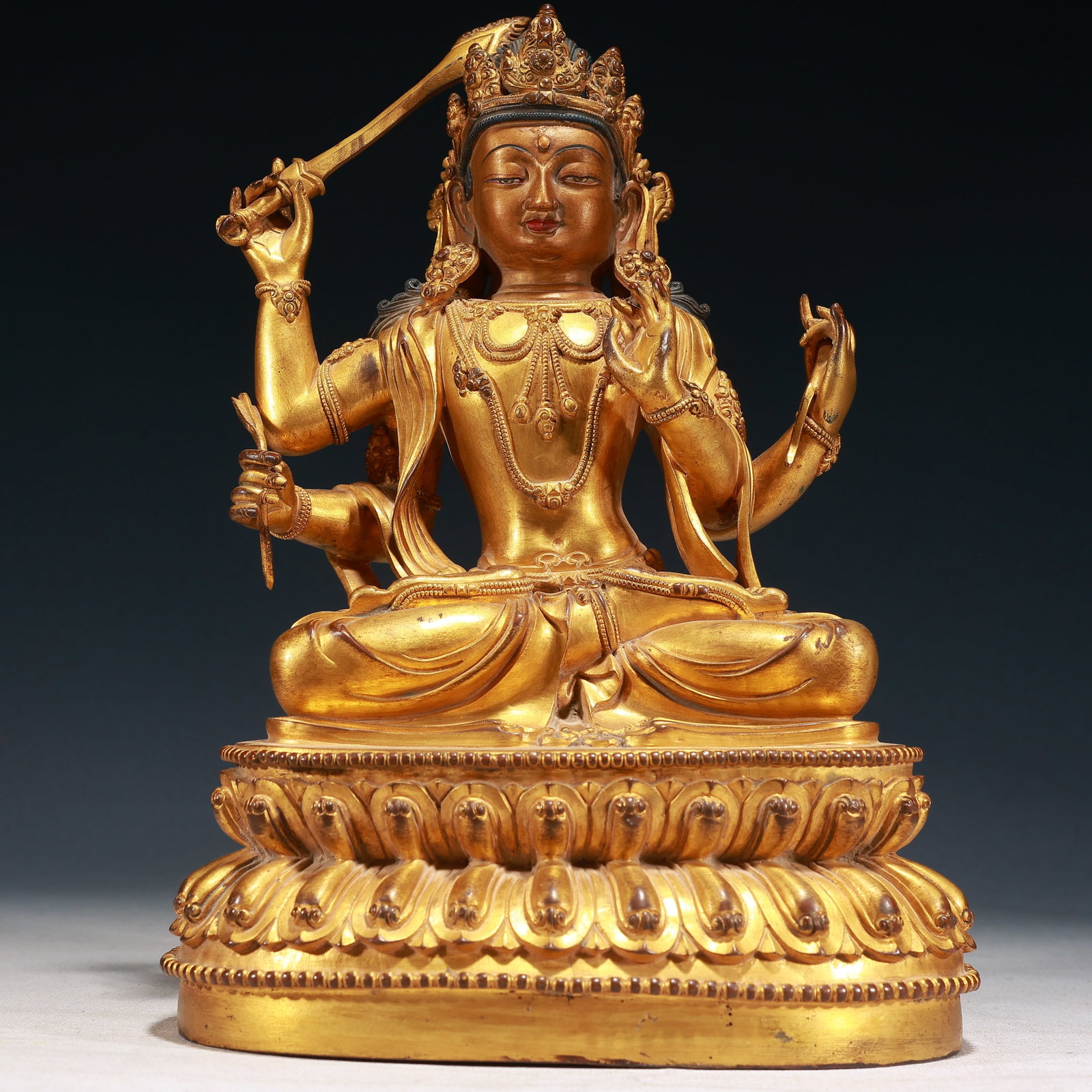 A Solemn Gilt Bronze Statue of Manjusri: A Solemn Gilt Bronze Statue of Manjusri,Ming Dynasty,China,Yongle Six-character Mark,Size:11.8inx8.7inx6.3in,Weight:4500g