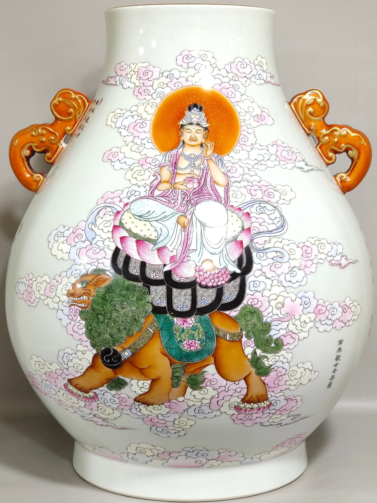 A Huge Famille-Rose Painted Gold Statue of Manjusri Rides the Lion Pattern Double-Ears Vase,With: A Huge Famille-Rose Painted Gold Statue of Manjusri Rides the Lion Pattern Double-Ears Vase,With Poem,Qing Dynasty,China,Qianlong Six-character Mark,Size:19.3inx14.6in 粉彩描金