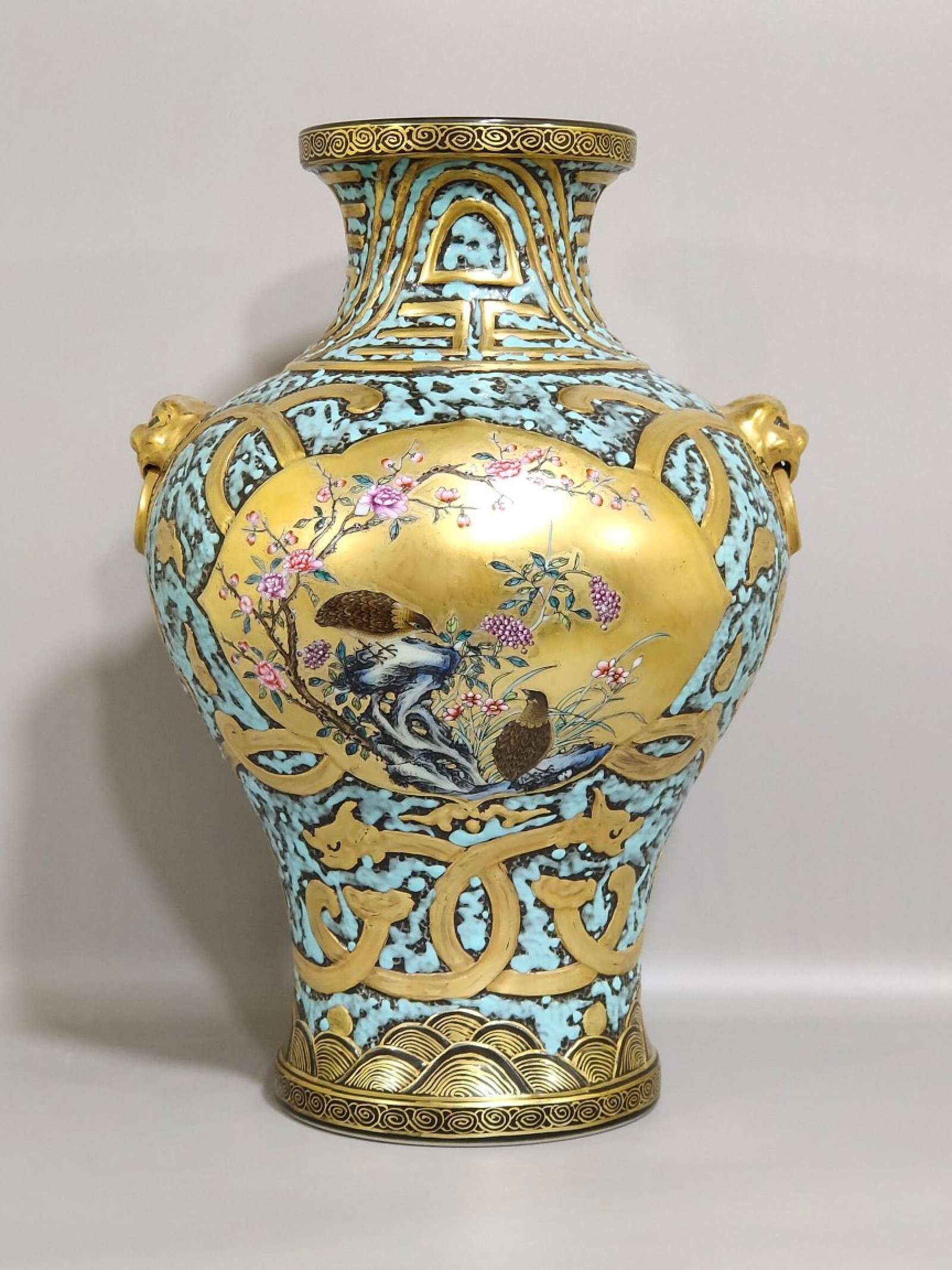 A Rare Ancient Bronze Color Painted Gold Flower and Bird Pattern Beast-Ears Vase: A Rare Ancient Bronze Color Painted Gold Flower and Bird Pattern Beast-Ears Vase,Qing Dynasty,China,Qianlong Six-character Mark,Size:11.8inx7.9in 古铜彩描金花࿏