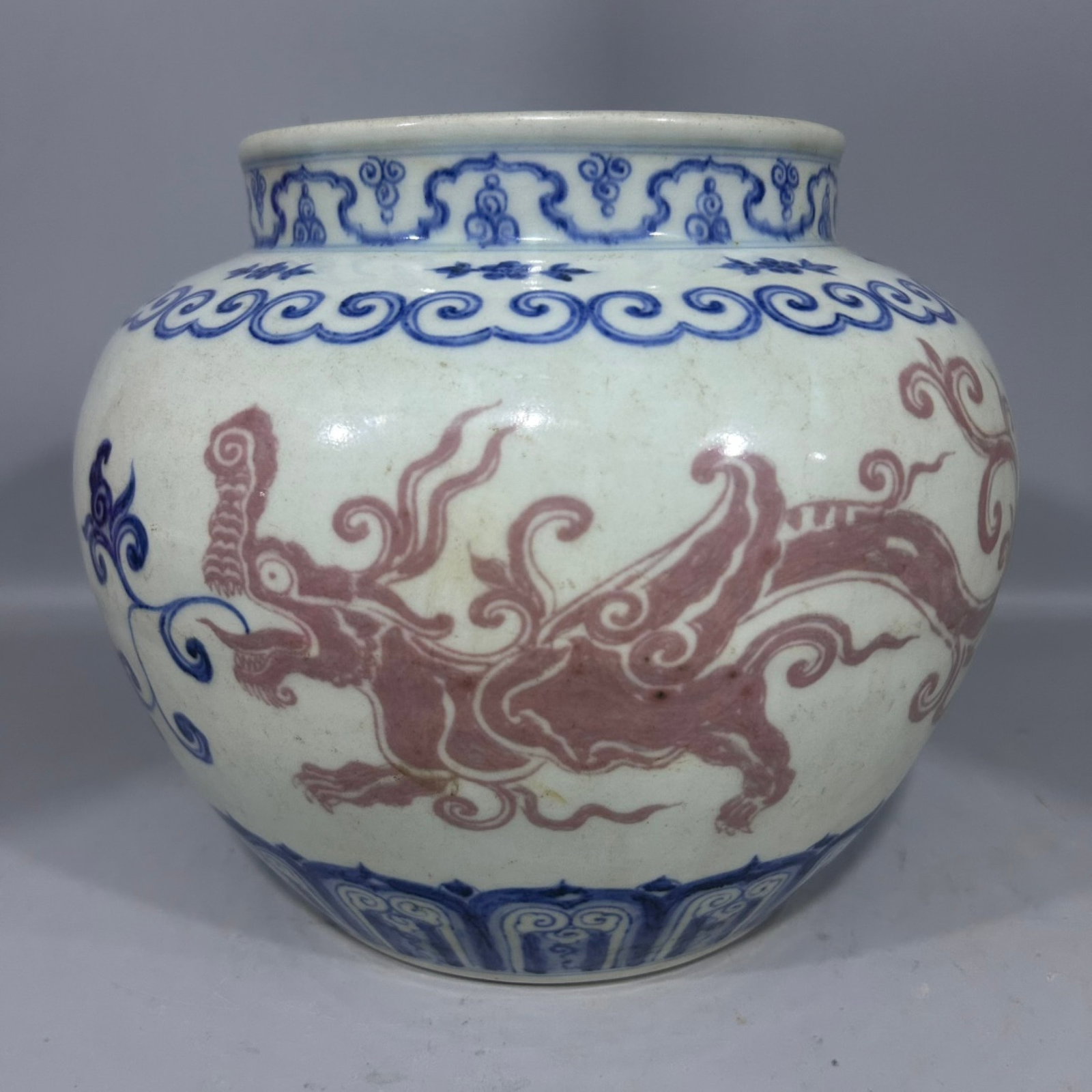 An Exquisite Blue and White Underglaze-Red Dragon Pattern Jar: An Exquisite Blue and White Underglaze-Red Dragon Pattern Jar,Ming Dynasty,China,Xuande Six-character Mark,Size:7.3inx8.3in 青花釉里红龙纹罐,中