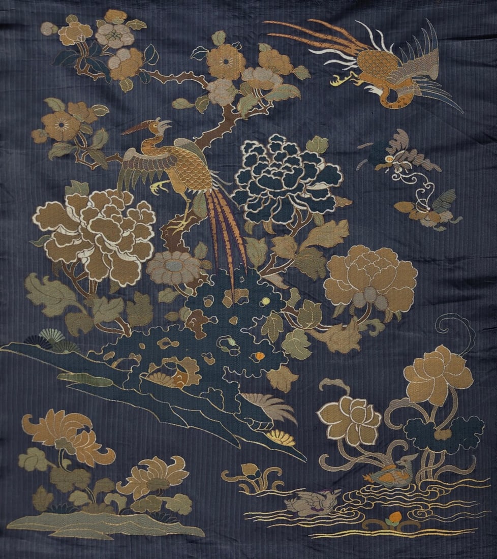 An exquisite kesi of flowers and birds: An exquisite brocade of flowers and birds, Qing Dynasty, China. Making an exquisite brocade requires multiple complex processes, including design, weaving, sizing, cutting, etc. Craftsmen need exquisi