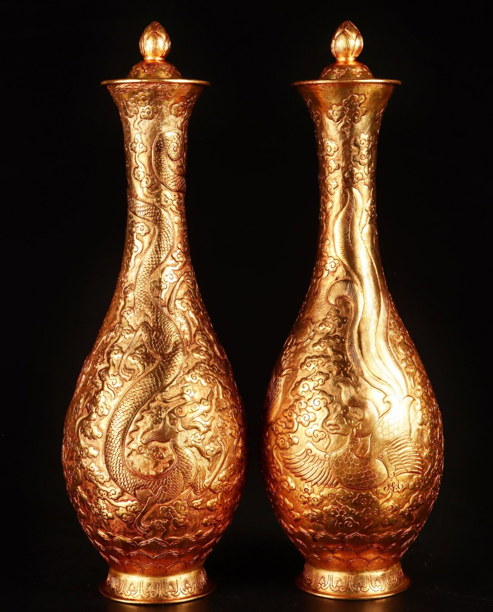 A Pair of Rare Gilt Bronze Auspicious Cloud,Dragon and Phoenix Pattern Vases: A Pair of Rare Gilt Bronze Auspicious Cloud,Dragon and Phoenix Pattern Vases,Tang Dynasty,China,Zhenguan Four-character Mark,Size:13.4inx4.3in,Total Weight:2500g