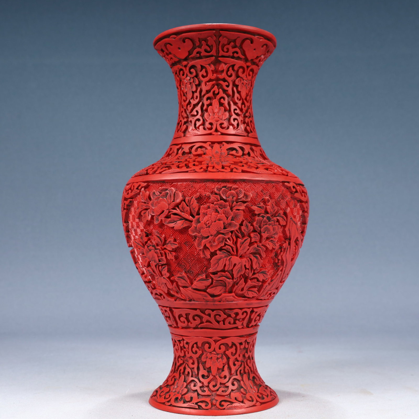 A Rare Carved Red Lacquer Flower Pattern Vase: A Rare Carved Red Lacquer Flower Pattern Vase,Qing Dynasty, China,Size:5.5inx11.8in,Weight:1150g 剔红漆花卉纹瓶,中国清代