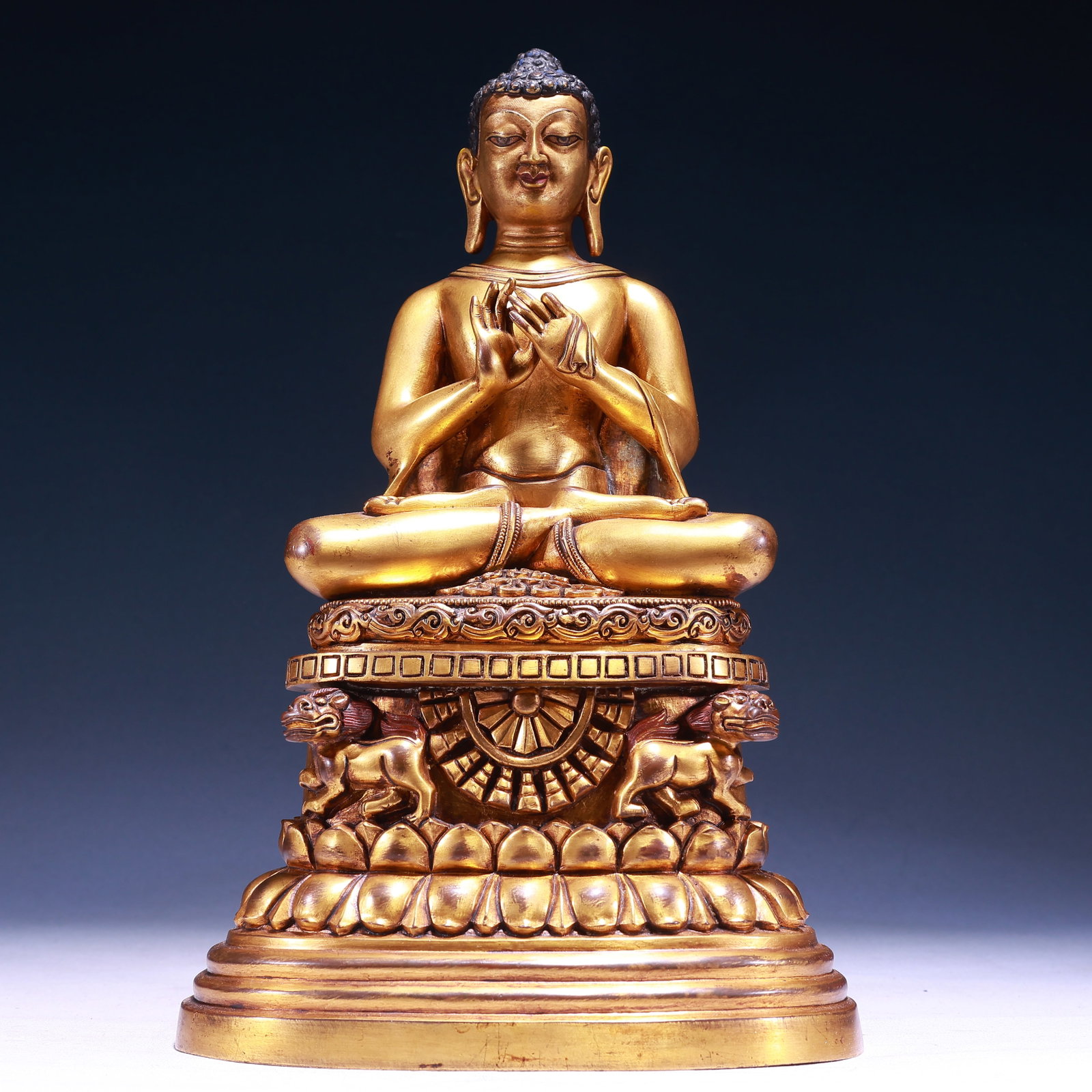A Solemn Gilt Bronze Statue of Sakyamuni: A Solemn Gilt Bronze Statue of Sakyamuni,Qing Dynasty,China,Size:13inx8.7inx7.1in,Weight:8350g 铜鎏金释迦摩尼像,中国清代