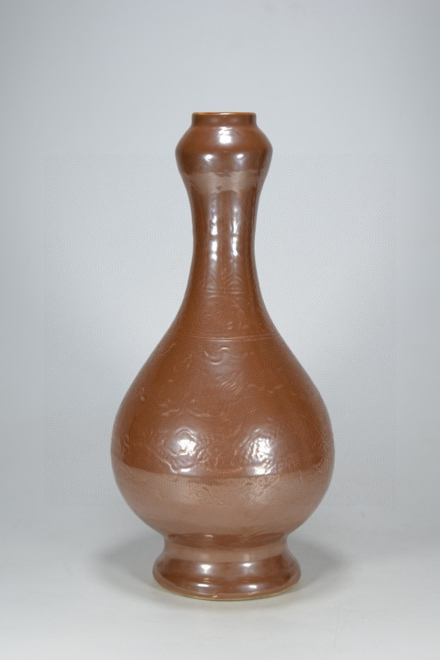 A Rare Brown Glazed Dragon and Phoenix Pattern Vase: A Rare Brown Glazed Dragon and Phoenix Pattern Vase,Ming Dynasty,China,Size:13inx7.1in 褐彩龙凤纹瓶,中国明代