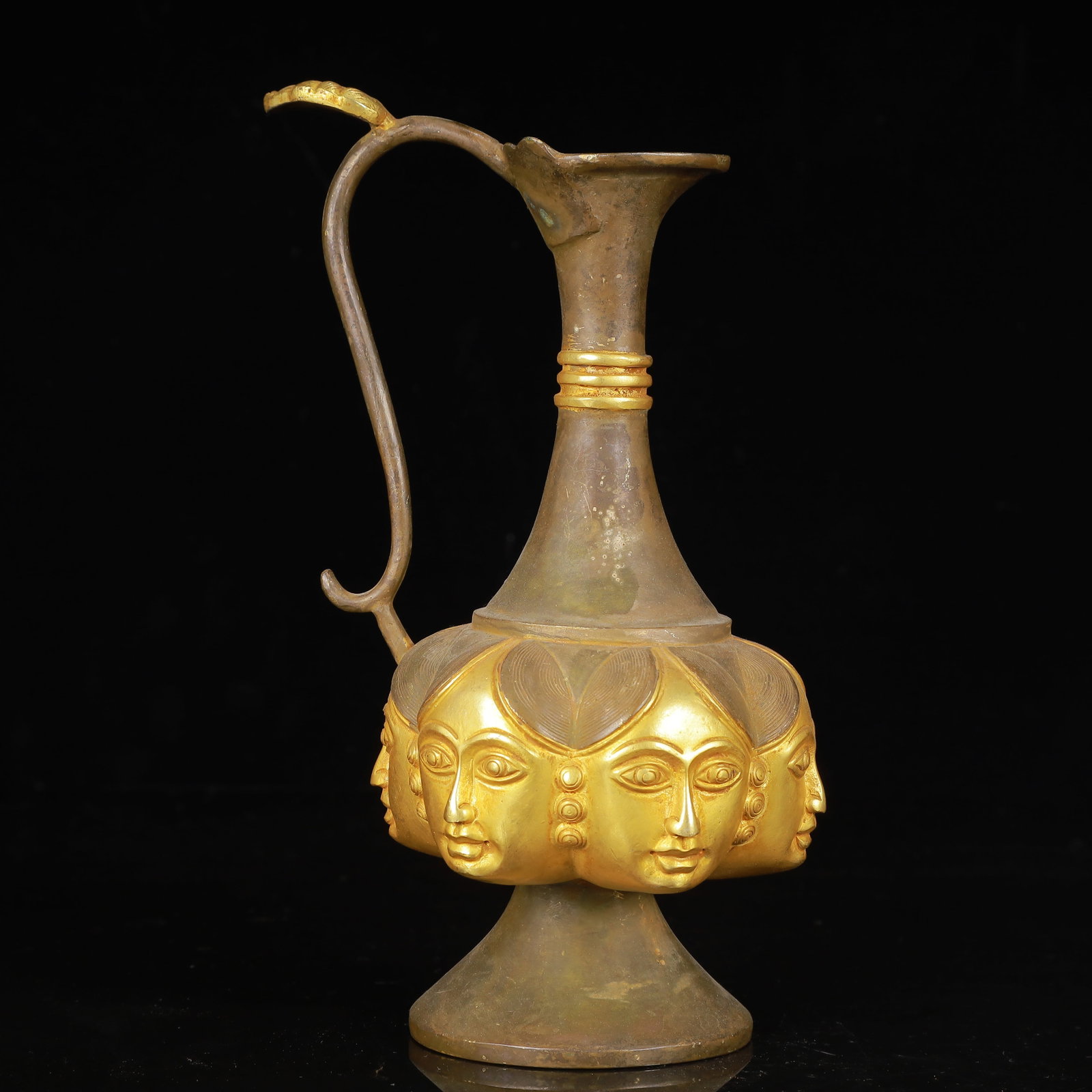 An Exquisite Gilt Silver Figure-Face Pattern Ewer: An Exquisite Gilt Silver Figure-Face Pattern Ewer,Qing Dynasty,China,Size:4.3inx8.3in,Weight:650g 银鎏金人面纹执壶,中国清代