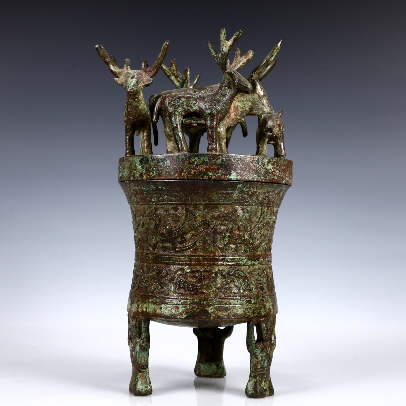 A Rare Bronze Auspicious Beast Tripod Jar: A Rare Bronze Auspicious Beast Tripod Jar,W.Zhou,China,Size:5.9inx12.2in,Weight:3200g 青铜瑞兽三足罐,中国西周时期