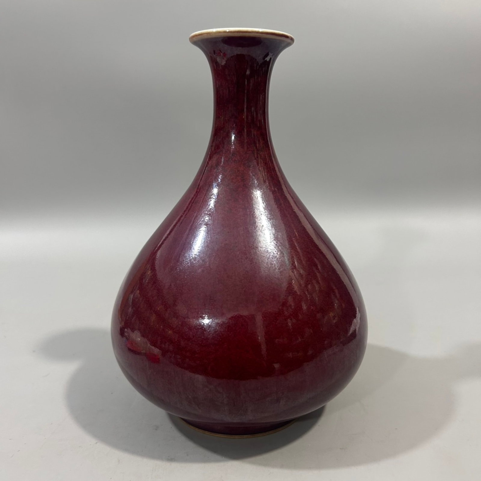 An Exquisite Ji Red Glazed Vase: An Exquisite Ji Red Glazed Vase,Qing Dynasty,China,Xuande Six-character Mark,Size:4.7inx8.7in 霁红釉瓶,中国清代,宣德六字款
