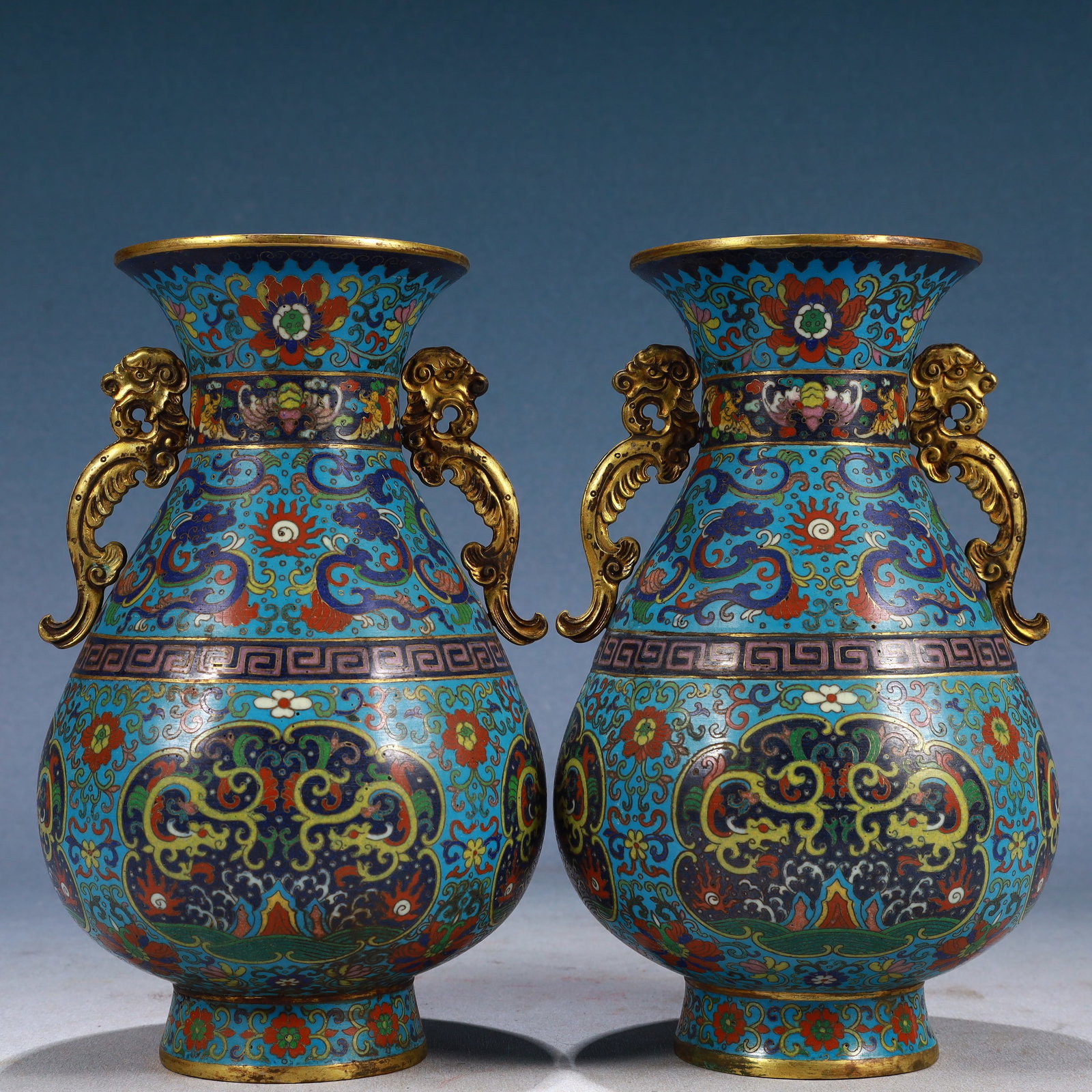 A Pair of Exquisite Cloisonne Lotus and Dragon Pattern Dragon-Ears Vases: A Pair of Exquisite Cloisonne Lotus and Dragon Pattern Dragon-Ears Vases,Qing Dynasty, China,Qianlong Four-character Mark,Size:4.7inx8.7in,Weight:2250g