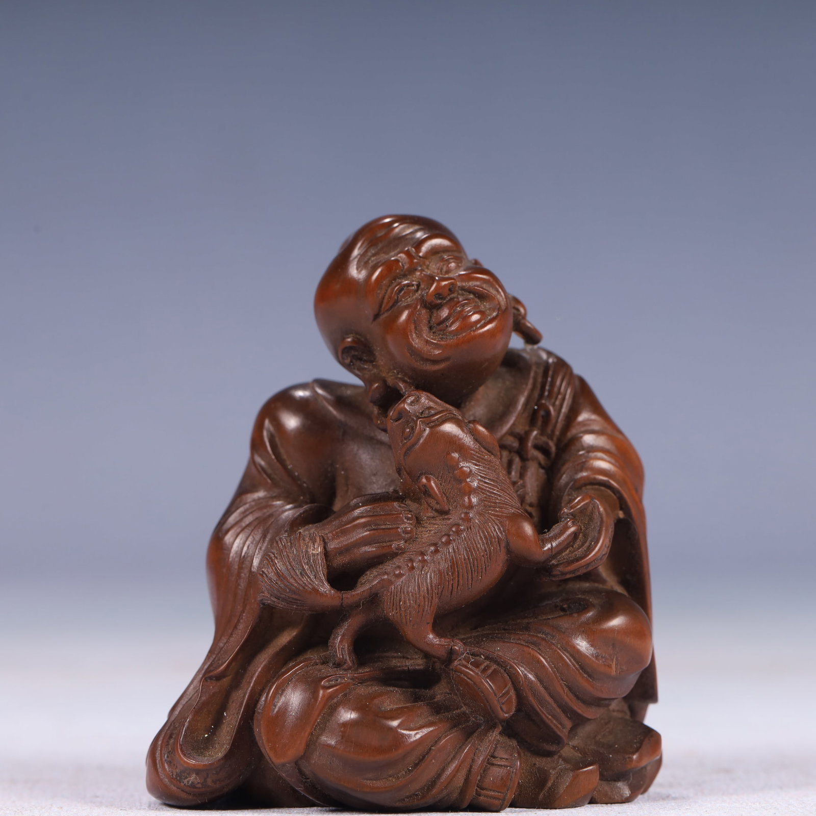 An Exquisite Boxwood Figure Ornament: An Exquisite Boxwood Figure Ornament,Qing Dynasty, China,Size:2.4inx2inx3in,Weight:100g 黄杨木人物摆件,中国清代