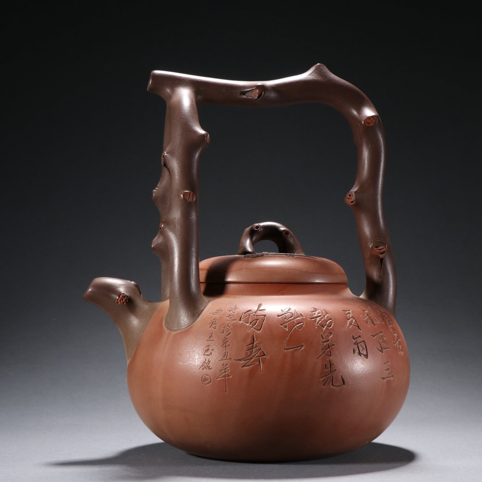 A Rare Purple Sands Flower and Bird Pattern Loop-Handled Pot,with poem: A Rare Purple Sands Flower and Bird Pattern Loop-Handled Pot,with poem,Qing Dynasty,China,Zhou Guizhen Mark,Size:9.1inx7.5in 紫砂花鸟纹提梁壶,带&#