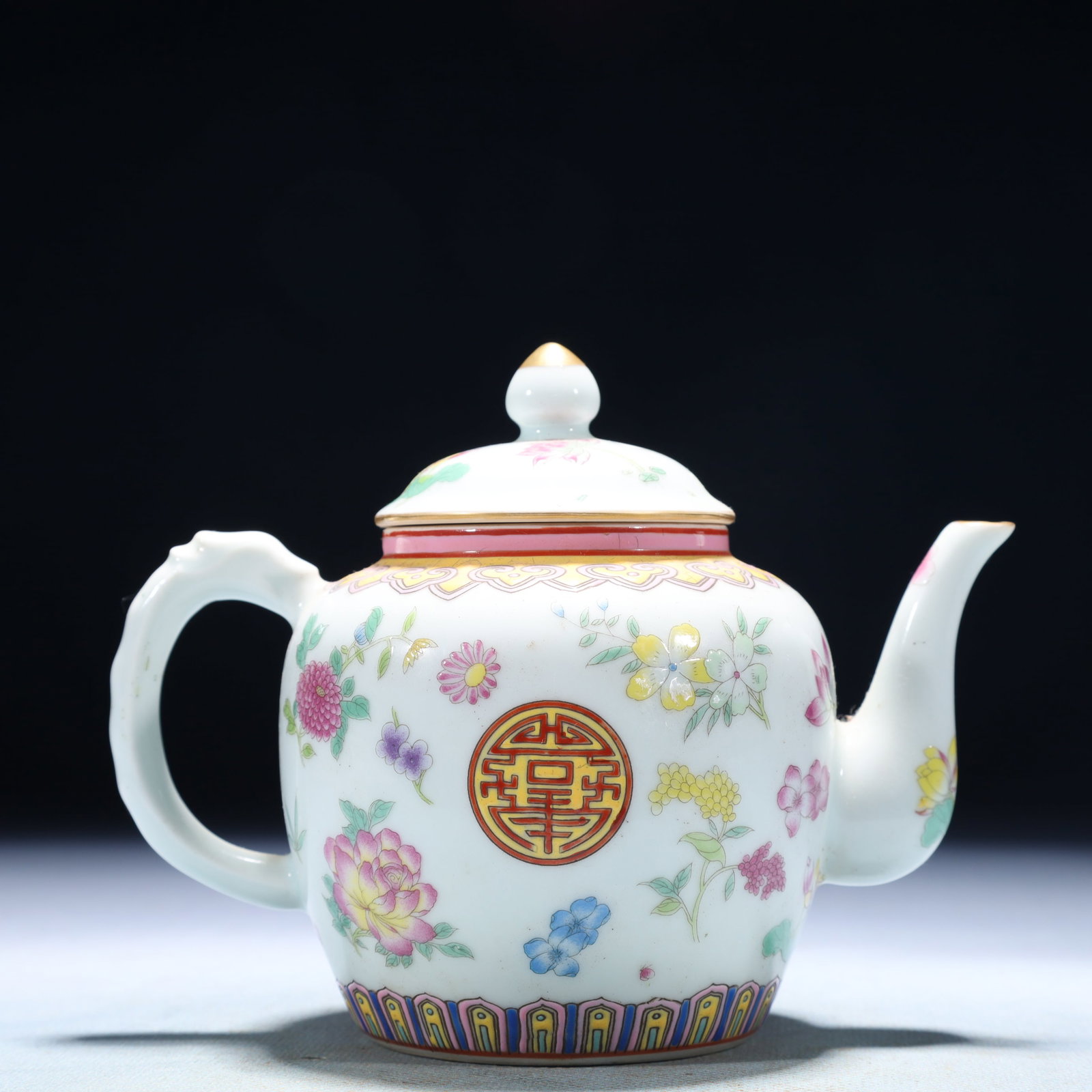 An Exquisite Famille-Rose Flower Pattern Teapot: An Exquisite Famille-Rose Flower Pattern Teapot,Qing Dynasty,China,Yongzheng Four-character Mark,Size:5.9inx3.5inx4.7in,Weight:250g 粉彩花卉纹茶壶,中