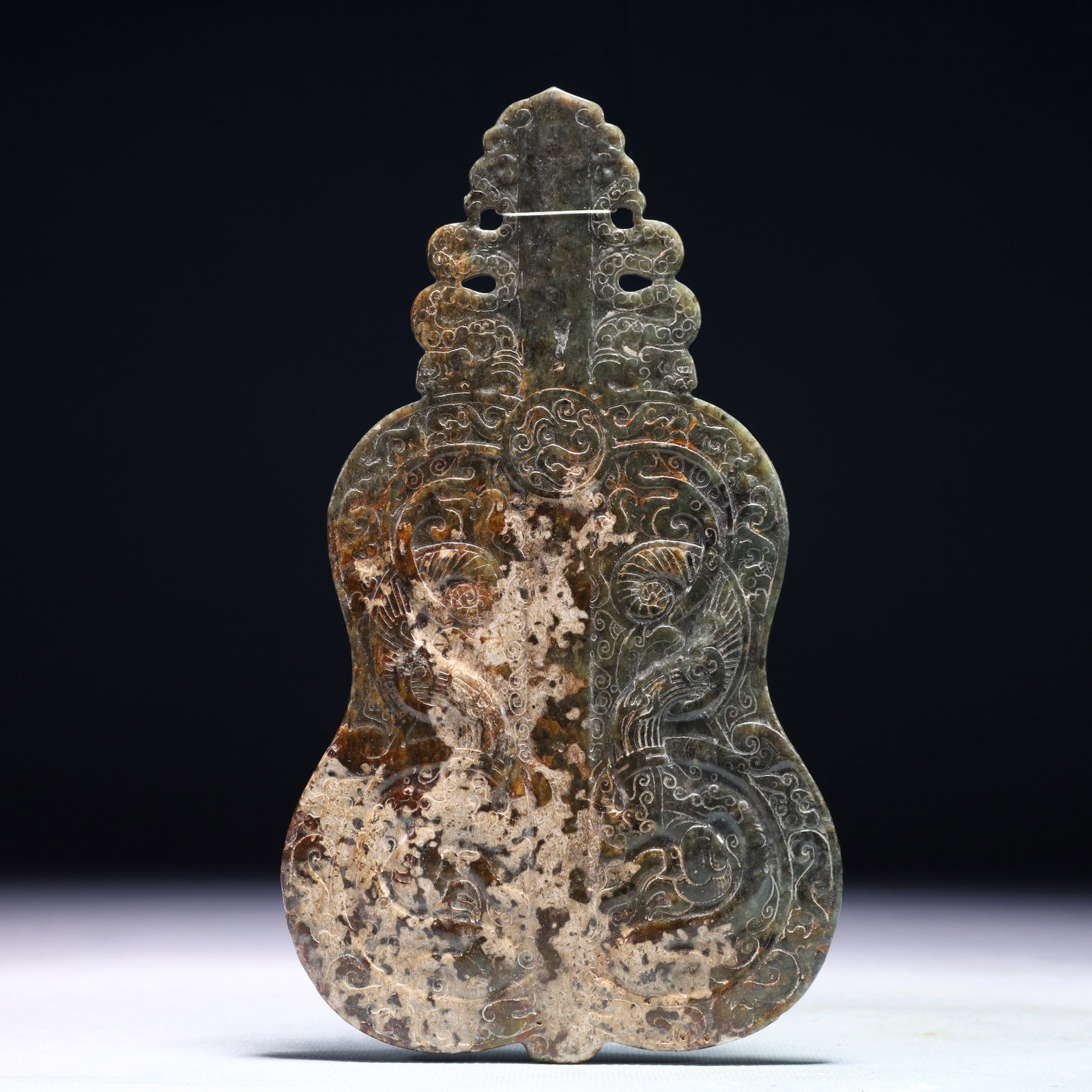 An Exquisite Jasper Beast Pattern Pendant: An Exquisite Jasper Beast Pattern Pendant,Qing Dynasty,China,Size:4.3inx7.7in,Weight:232.4g 碧玉兽纹挂件,中国清代