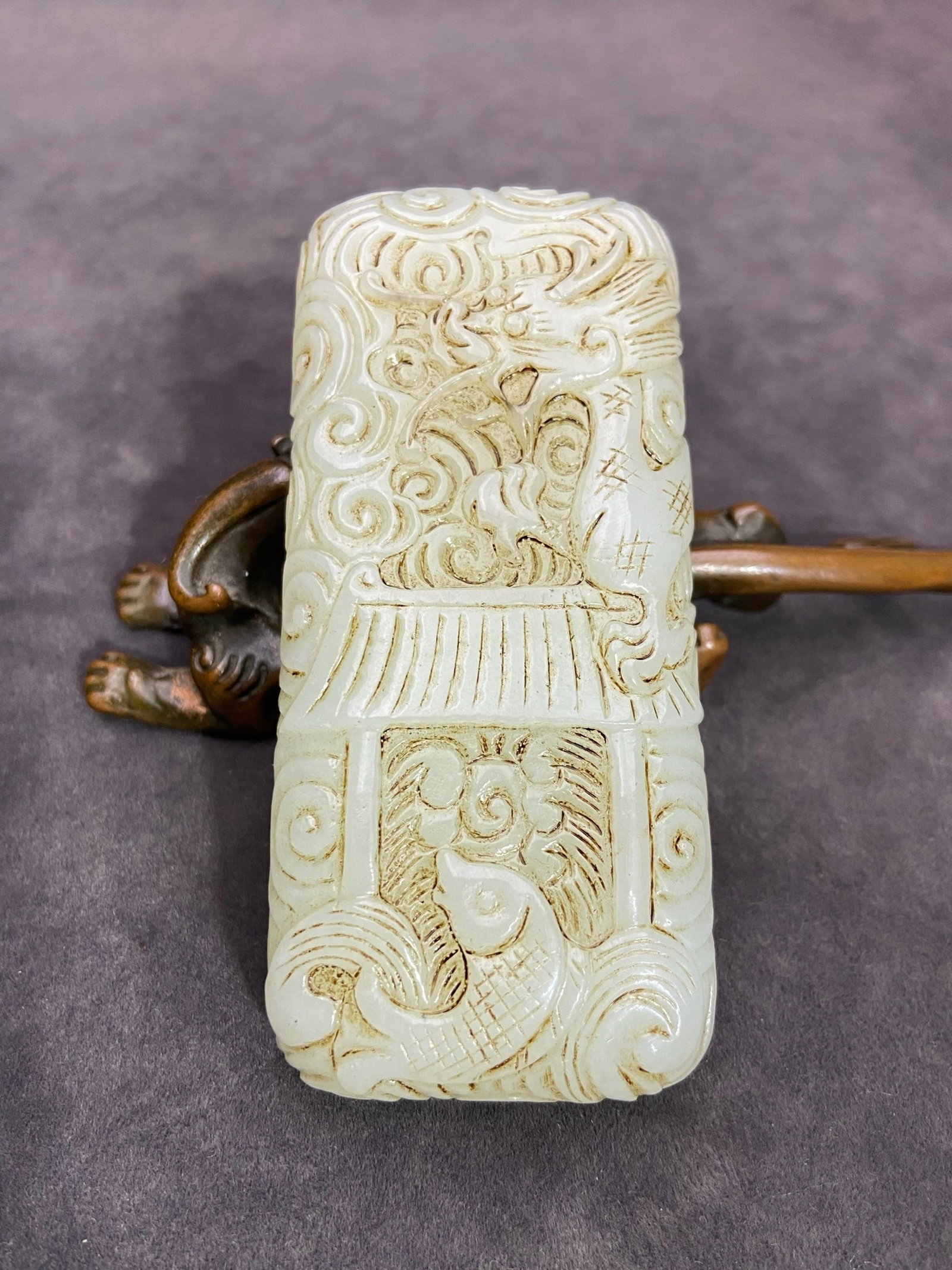 An Exquisite White Jade Fish Dragon Pattern Pendant: An Exquisite White Jade Fish Dragon Pattern Pendant,Qing Dynasty,China,Size:92mmx41mmx19.3mm,Weight:168g 白玉鱼龙纹挂件,中国清代