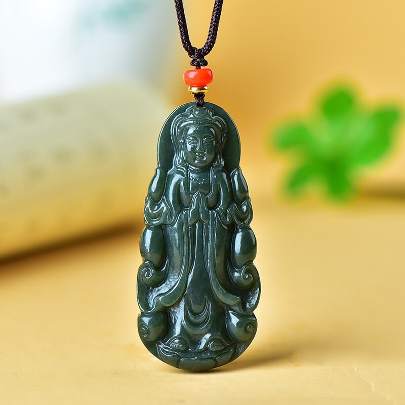 An Exquisite Sapphire Avalokitesvara Pattern Pendant: An Exquisite Sapphire Avalokitesvara Pattern Pendant,Size:65mmx31mm 寓意:寓意吉祥 玉脂温润 青玉观音像纹&