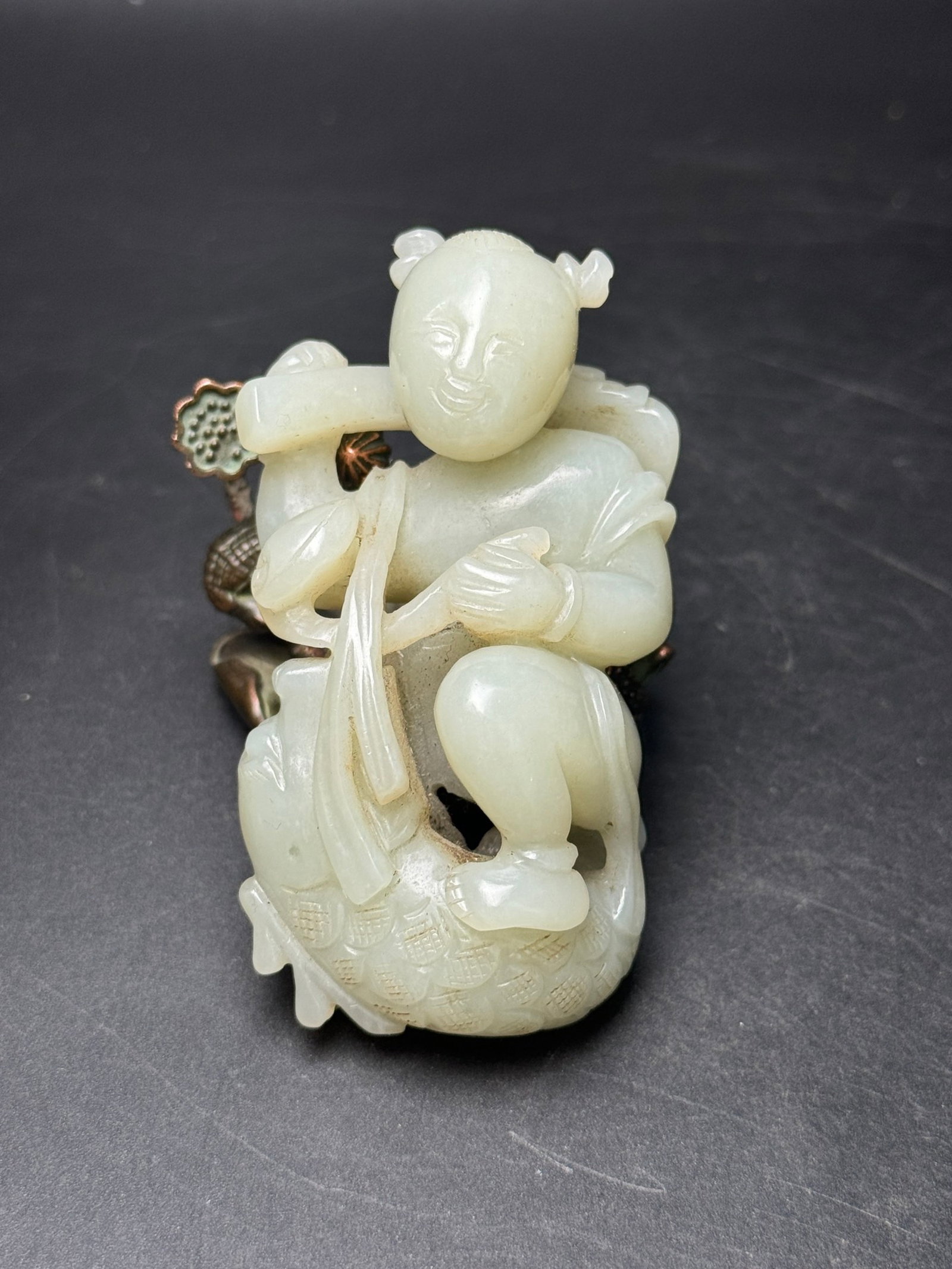 An Exquisite White Jade FigureFish Ornament: An Exquisite White Jade FigureFish Ornament,Qing Dynasty,China,Size:83mmx48mmx35mm,Weight:138g 白玉人物鱼摆件,中国清代