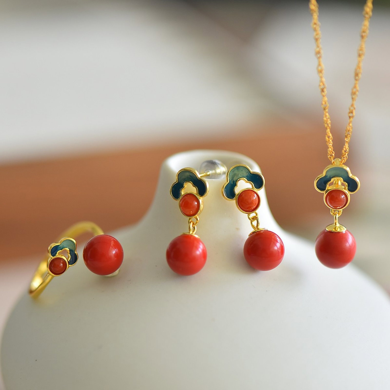 A Set of Fine Sterling Silver-Gold Plated Inlaid Cinnabar Jewelry,Inlaid Diamond: A Set of Fine Sterling Silver-Gold Plated Inlaid Cinnabar Jewelry,Inlaid Diamond,Size:(Pendant)8mmx8mm,(Earrings)8mmx8mm,(Ring)8mmx8mm 一套纯银镀金镶朱&