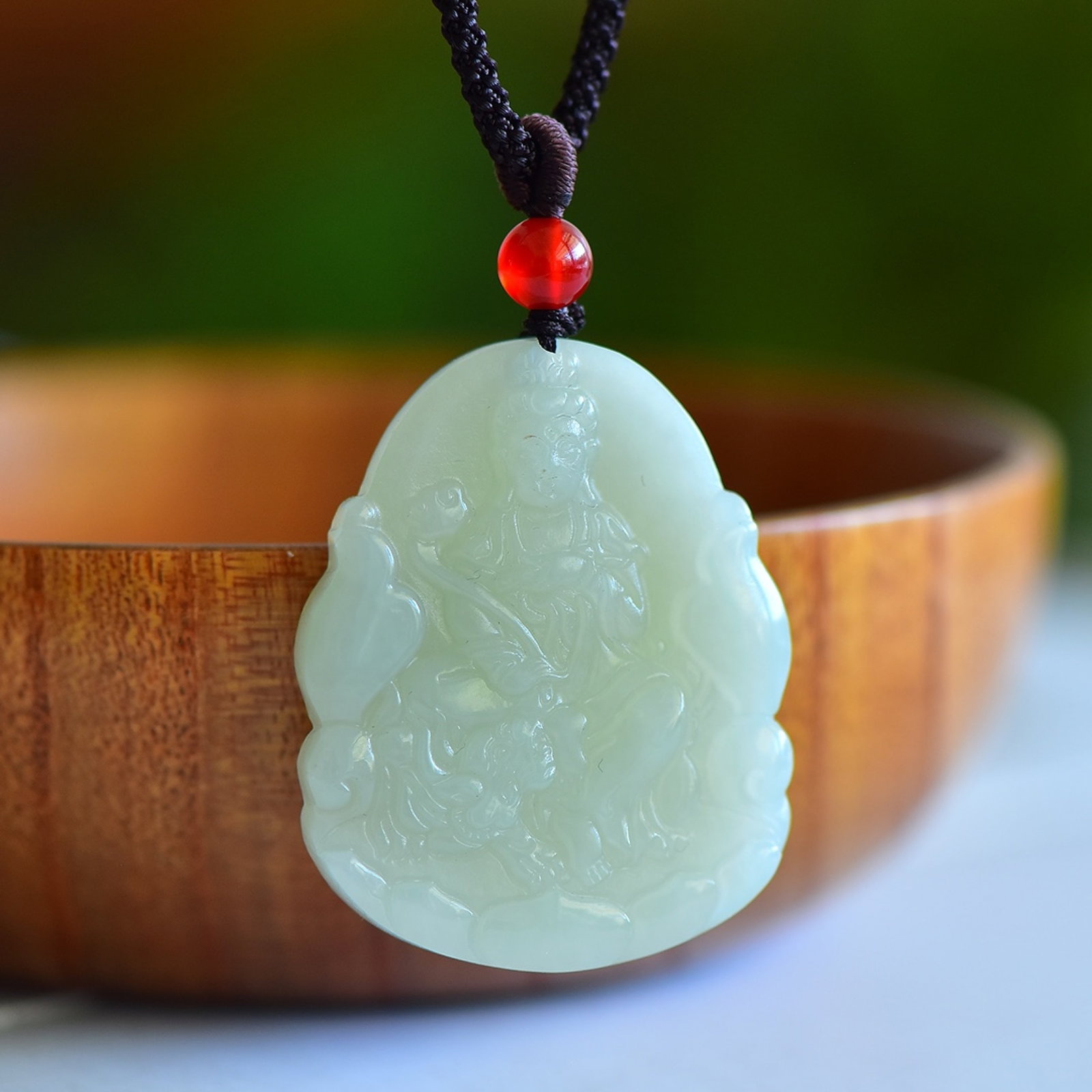 An Exquisite Greenish Jade Bodhisattva and Rabbit Pattern Pendant: An Exquisite Greenish Jade Bodhisattva and Rabbit Pattern Pendant,Size:44mmx34mmx8mm 寓意:生肖属兔佩戴,佩戴可使一生&
