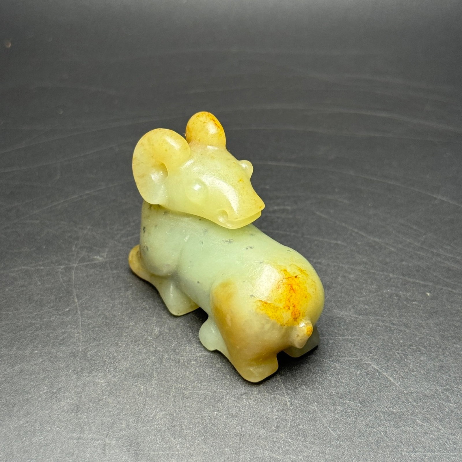 An Exquisite White Jade Sheep Pendant: An Exquisite White Jade Sheep Pendant,Qing Dynasty,China,Size:52mmx43mmx22mm,Weight:69g 白玉羊挂件,中国清代
