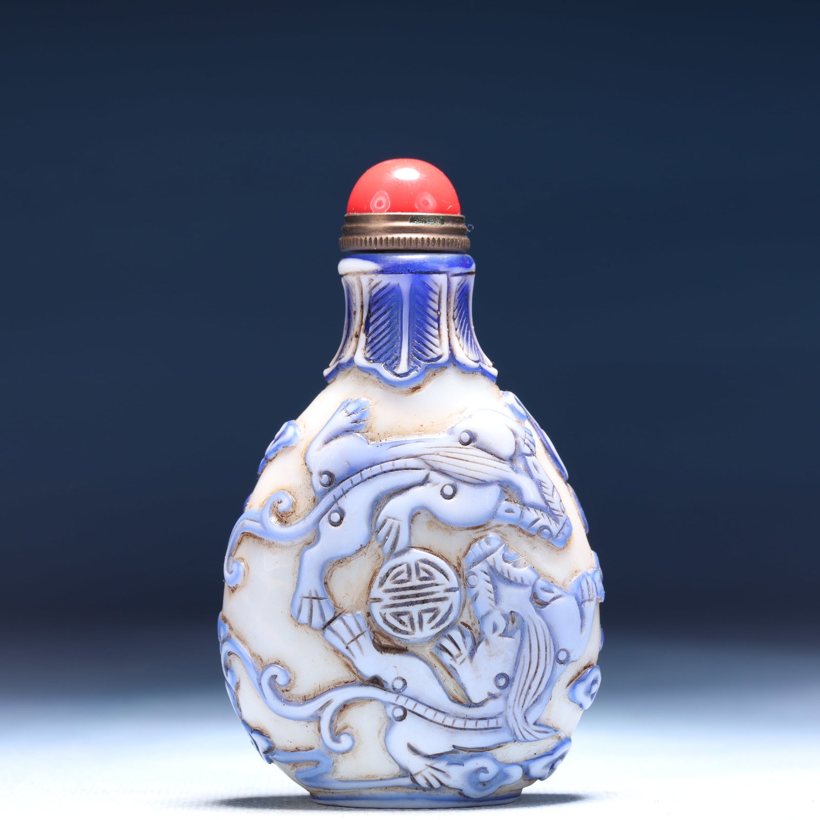 An Exquisite Glass Auspicious Beast Pattern Snuff Bottle: An Exquisite Glass Auspicious Beast Pattern Snuff Bottle,Qing Dynasty,China,Qianlong Four-character Mark,Size:2inx1.2inx3.5in,Weight:59g
