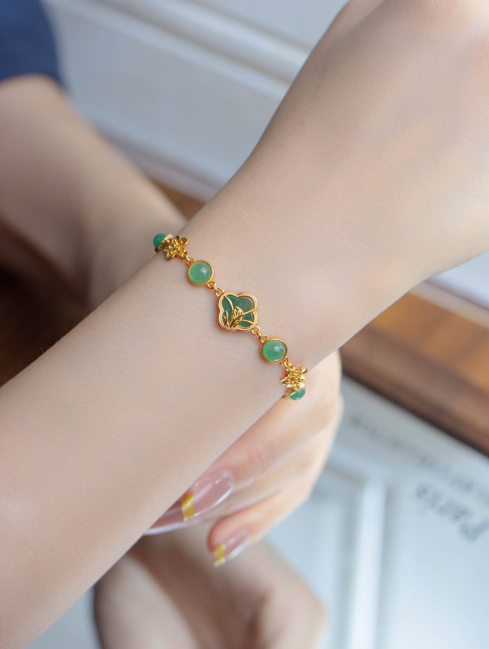 An Exquisite Sterling Silver-Gold Plated Inlaid Jadeite Bracelets: An Exquisite Sterling Silver-Gold Plated Inlaid Jadeite Bracelets 纯银镀金镶翡翠手链
