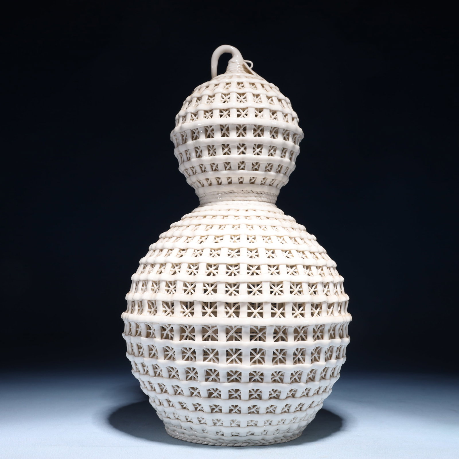 An Exquisite Blance-De-Chine Gourd-Shaped Vase: An Exquisite Blance-De-Chine Gourd-Shaped Vase Blance-De-Chine Gourd-Shaped Vase,Ming Dynasty,China,Size:7.5inx13.8in,Weight:1550g