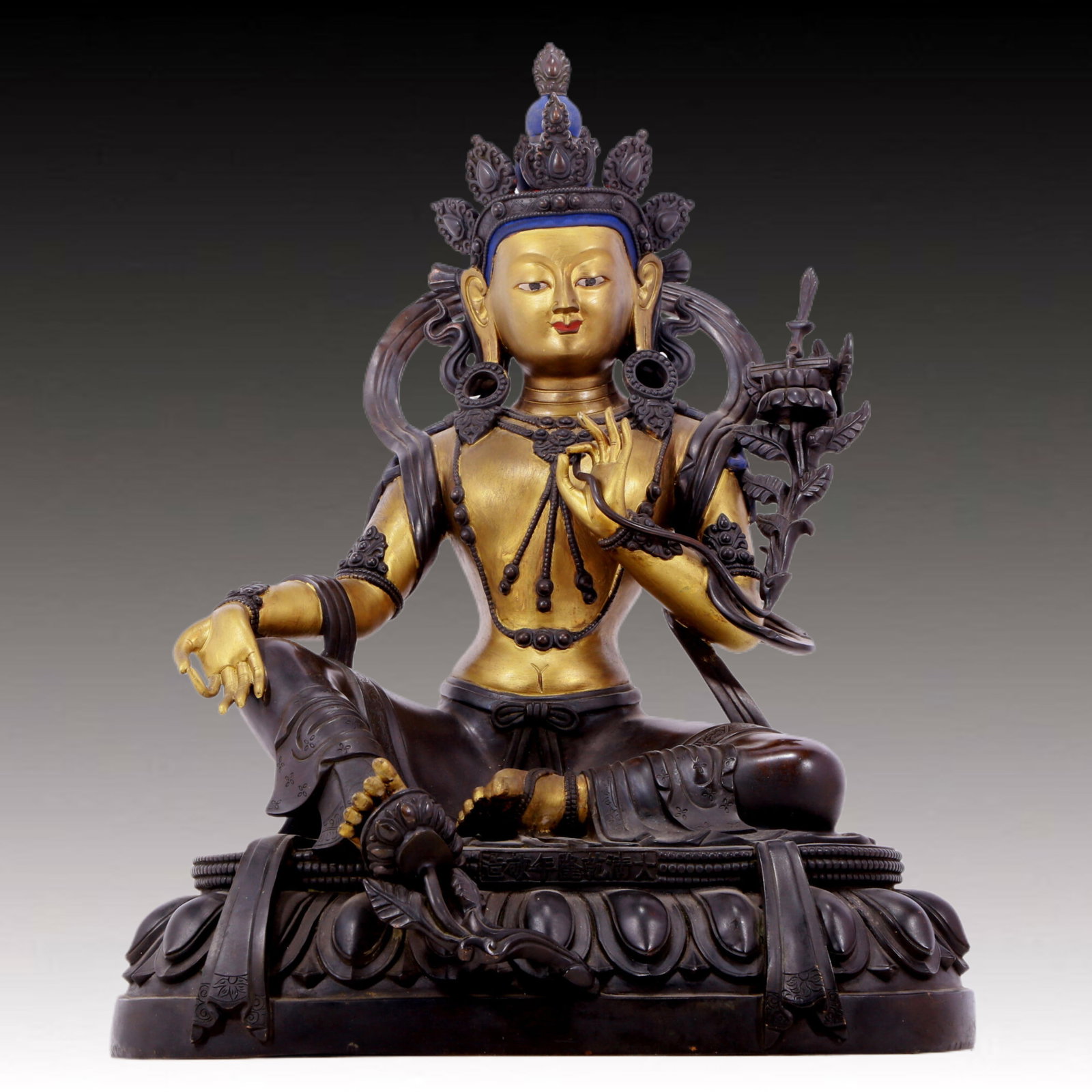 A solemn gilt bronze statue of green Tara (1 of 10)