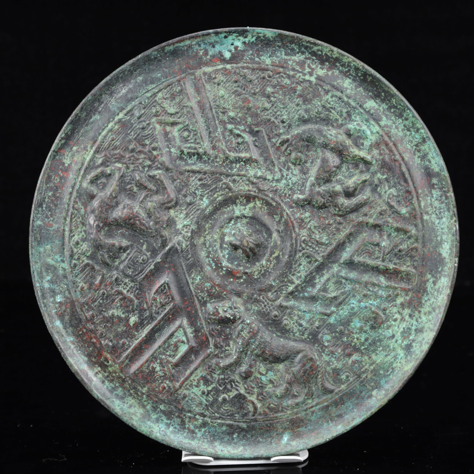 An Archaic Bronze Animal Pattern Round Mirror: An Archaic Bronze Animal Pattern Round Mirror,The Warring States period in China,Size:8.3inx0.6in,Weight:1150g