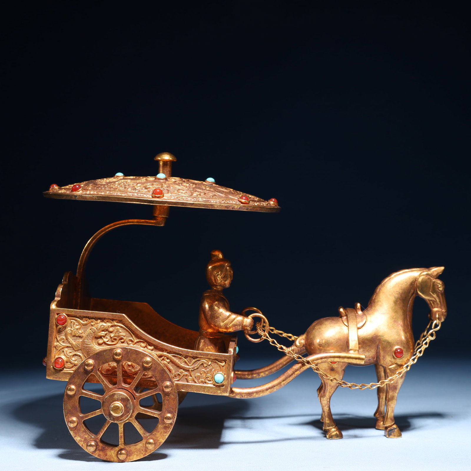 An Exquisite Gilt Bronze Lotus and Phoenix Pattern Carriage Ornament,Inlaid Gems: An Exquisite Gilt Bronze Lotus and Phoenix Pattern Carriage Ornament,Inlaid Gems,Tang Dynasty,China,With Mark,Size:9.1inx5.1inx6.7in,Weight:1600g 铜鎏金缠枝莲࠰