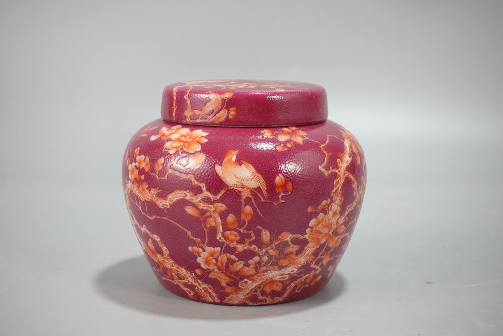 An Exquisite Ruby Red-Glazed Flower and Bird Pattern Jar: An Exquisite Ruby Red-Glazed Flower and Bird Pattern Jar,Qing Dynasty,China,Yongzheng Six-character Mark,Size:4.1inx4.6in