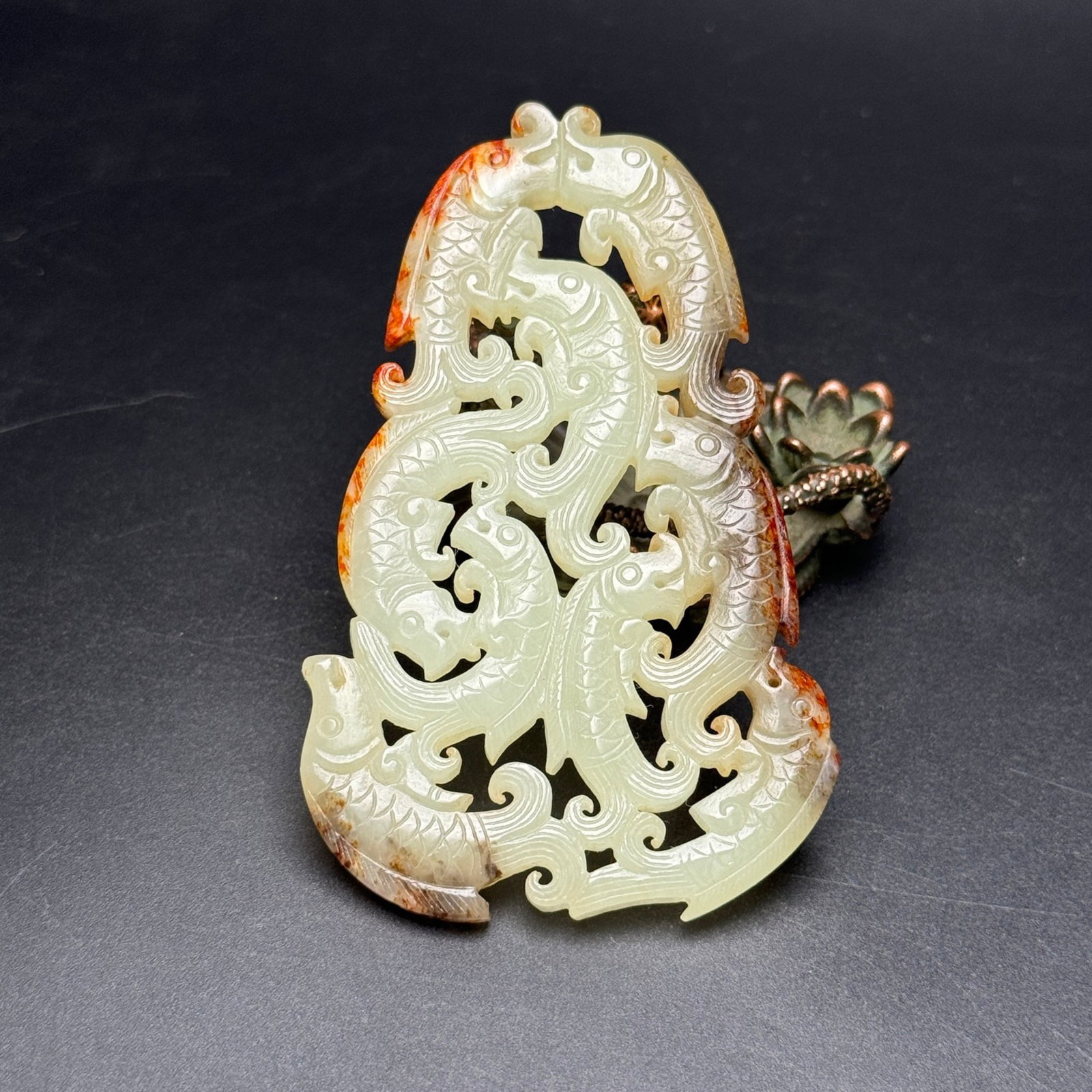 An Exquisite White Jade Fish Pattern Pendant: An Exquisite White Jade Fish Pattern Pendant,Qing Dynasty,China,Size:3.5inx2.2inx0.2in,Weight:49g 白玉鱼纹佩,中国清代