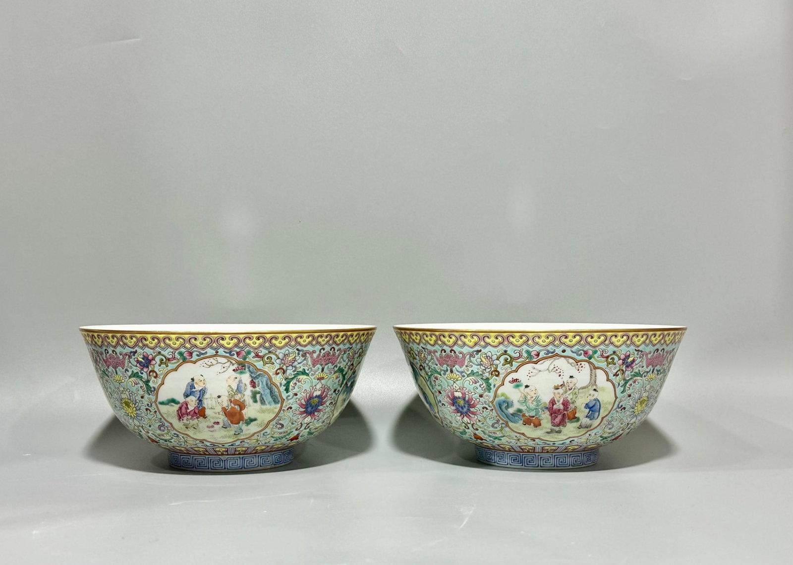 A Pair of Exquisite Green Ground Famille-Rose Character and Story Pattern Bowls (1 of 7)