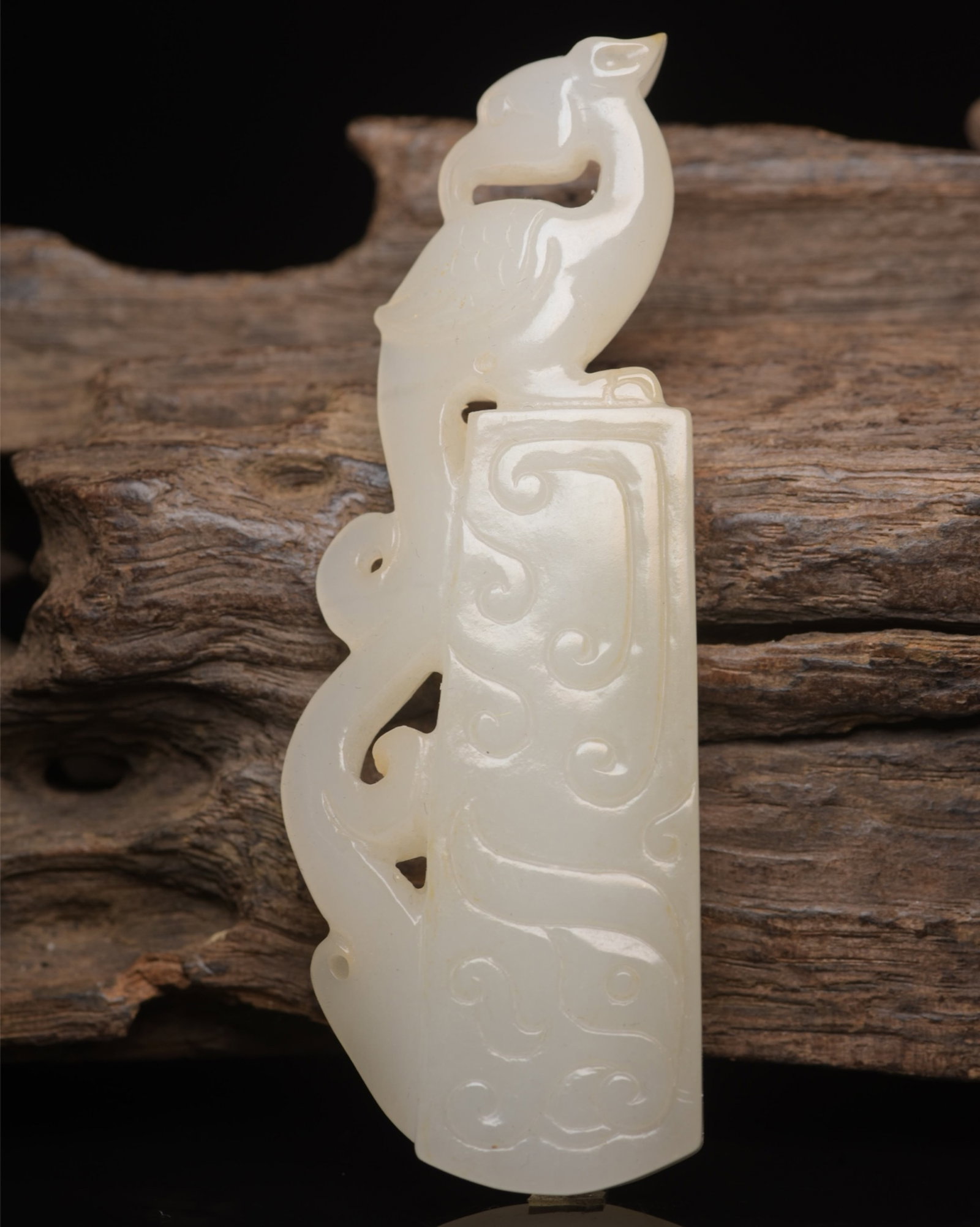An Exquisite White Jade Phoenix Pattern Pendant: An Exquisite White Jade Phoenix Pattern Pendant,Qing Dynasty,China,Size:3.5inx1.3inx0.4in,Weight:51g 白玉凤纹牌,中国清代