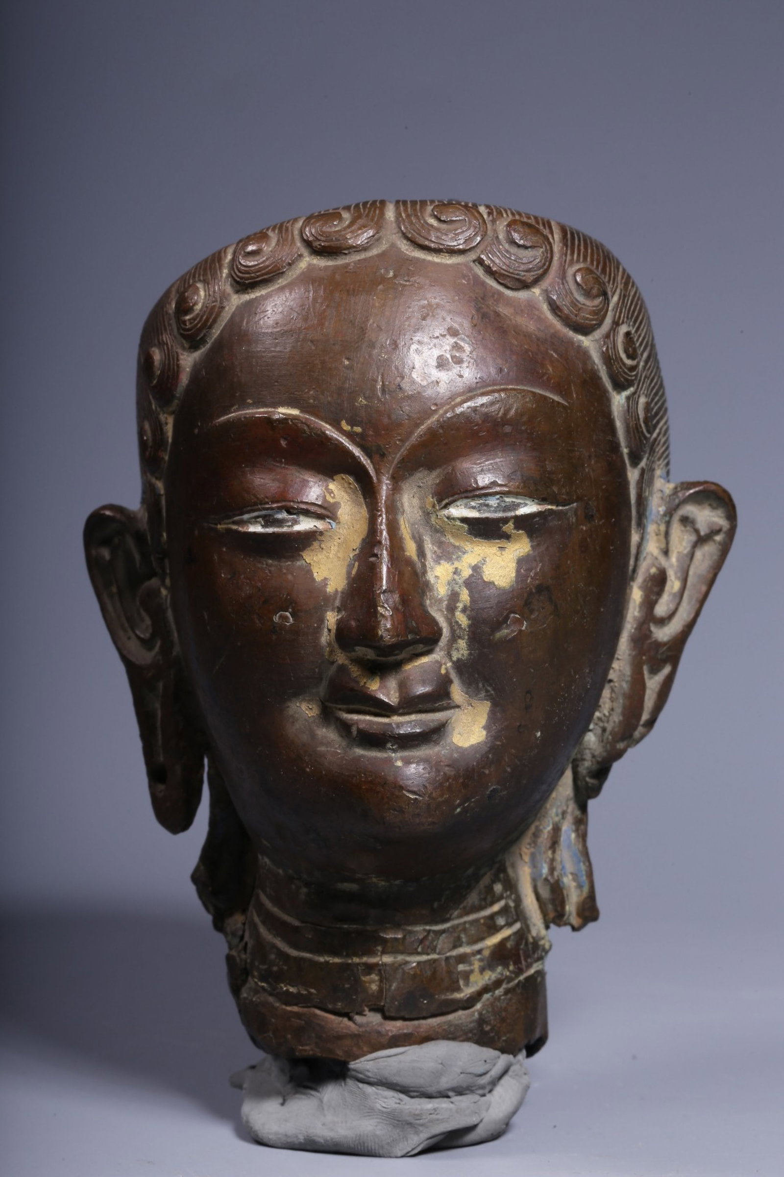 A Rare Bronze Guanyin's Head: A Rare Bronze Guanyin's Head,Qing Dynasty, China,Size:4.7inx3.5inx3.7in,Weight:741g 铜观音佛头,中国清代