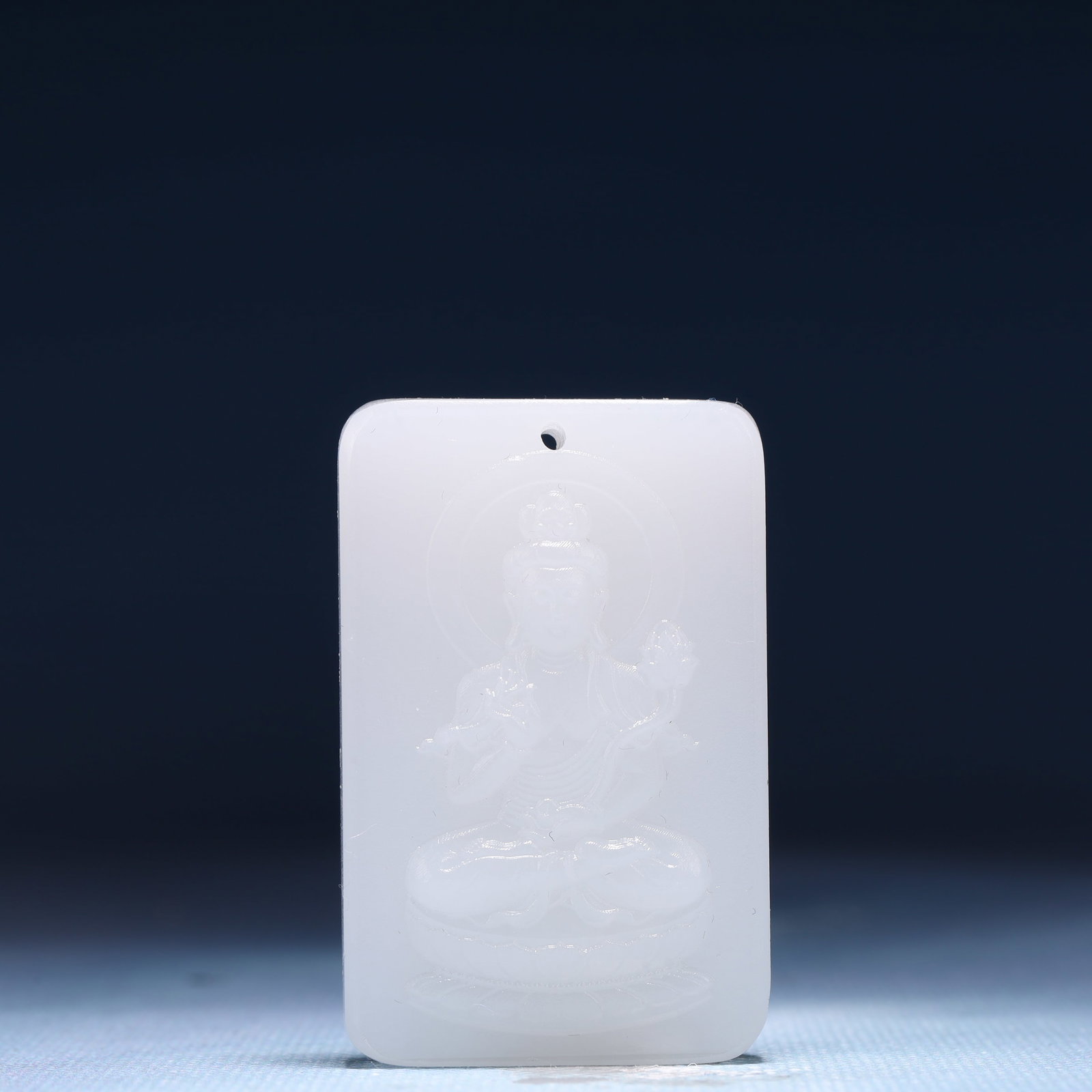 An Exquisite White Jade Statue of Avalokitesvara Pendant: An Exquisite White Jade Statue of Avalokitesvara Pendant,Size:1.6inx0.4inx2.2in,Weight:47g 白玉观音像牌