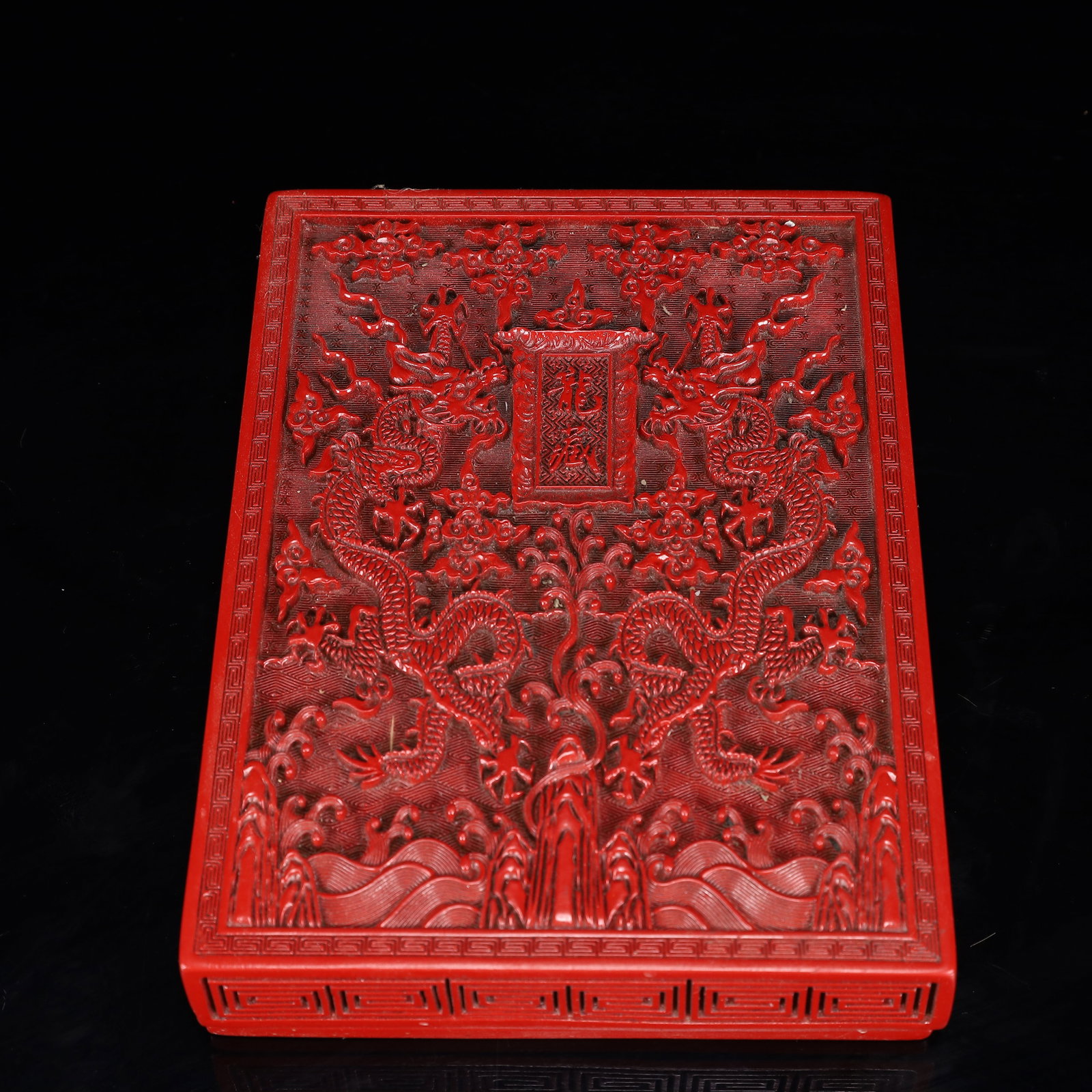 An Exquisite Carved Red Lacquer Dragon Pattern Box with Cover: An Exquisite Carved Red Lacquer Dragon Pattern Box with Cover,Qing Dynasty, China,Qianlong Four-character Mark,Size:8.3inx5.9inx1.6in,Weight:1000g
