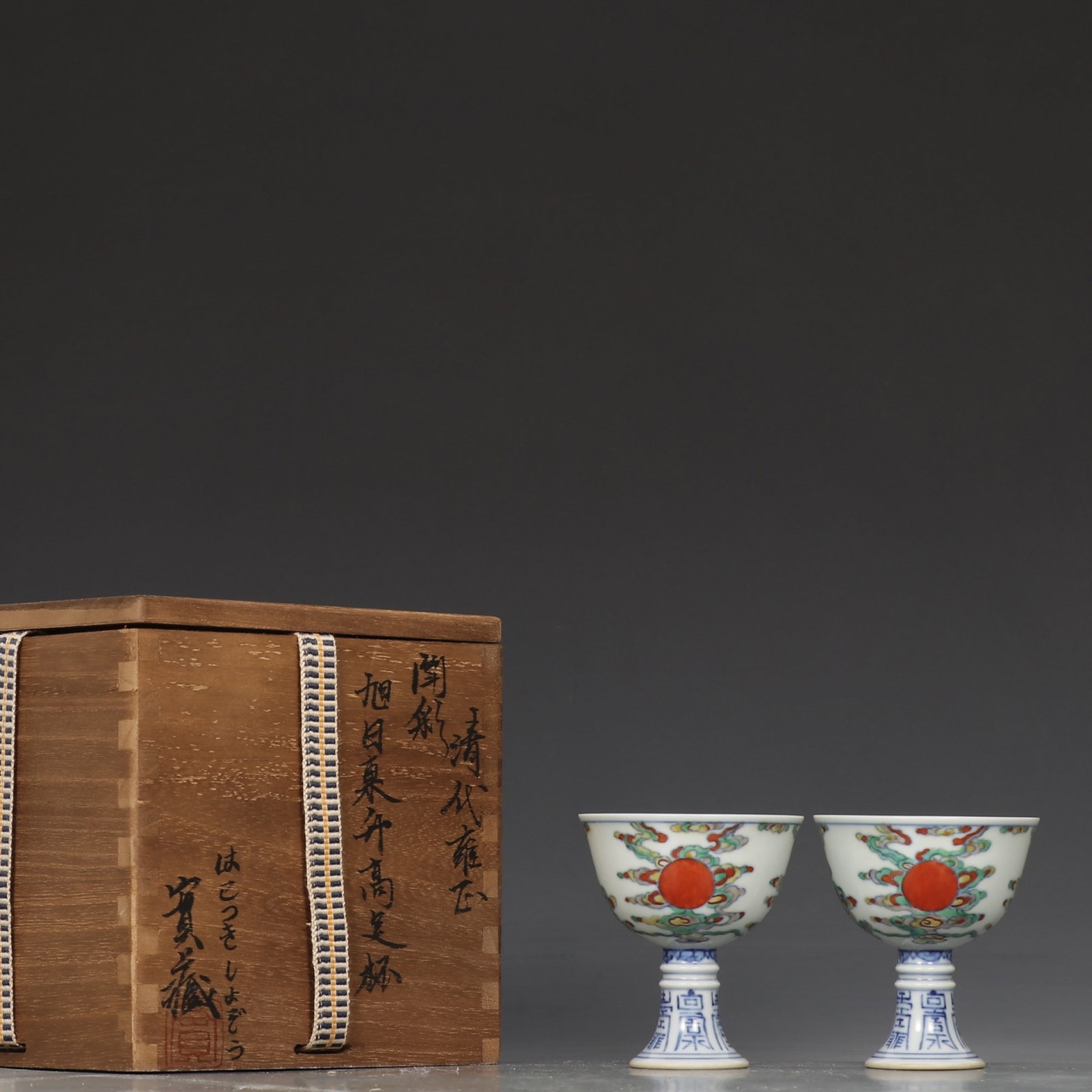 A Pair of Exquisite Doucai Auspicious Cloud Pattern Stem Cups: A Pair of Exquisite Doucai Auspicious Cloud Pattern Stem Cups,Qing Dynasty,China ,Yongzheng Six-character Mark,Size:3inx2.7in