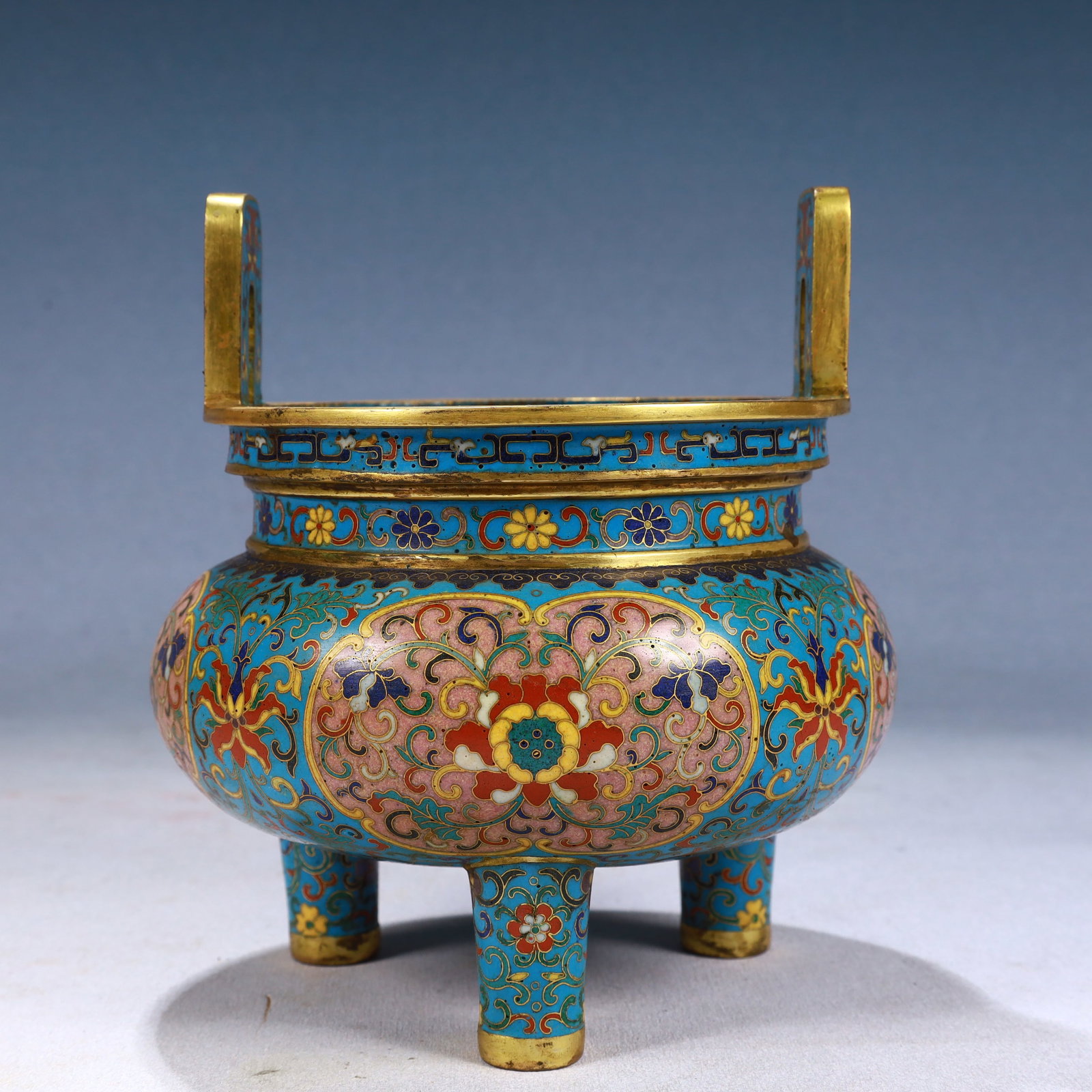 An Exquisite Cloisonne Lotus Pattern Double-Ears and Tripod Censer: An Exquisite Cloisonne Lotus Pattern Double-Ears and Tripod Censer,Qing Dynasty, China,Qianlong Four-character Mark,Size:5.9inx6.7in,Weight:1400g