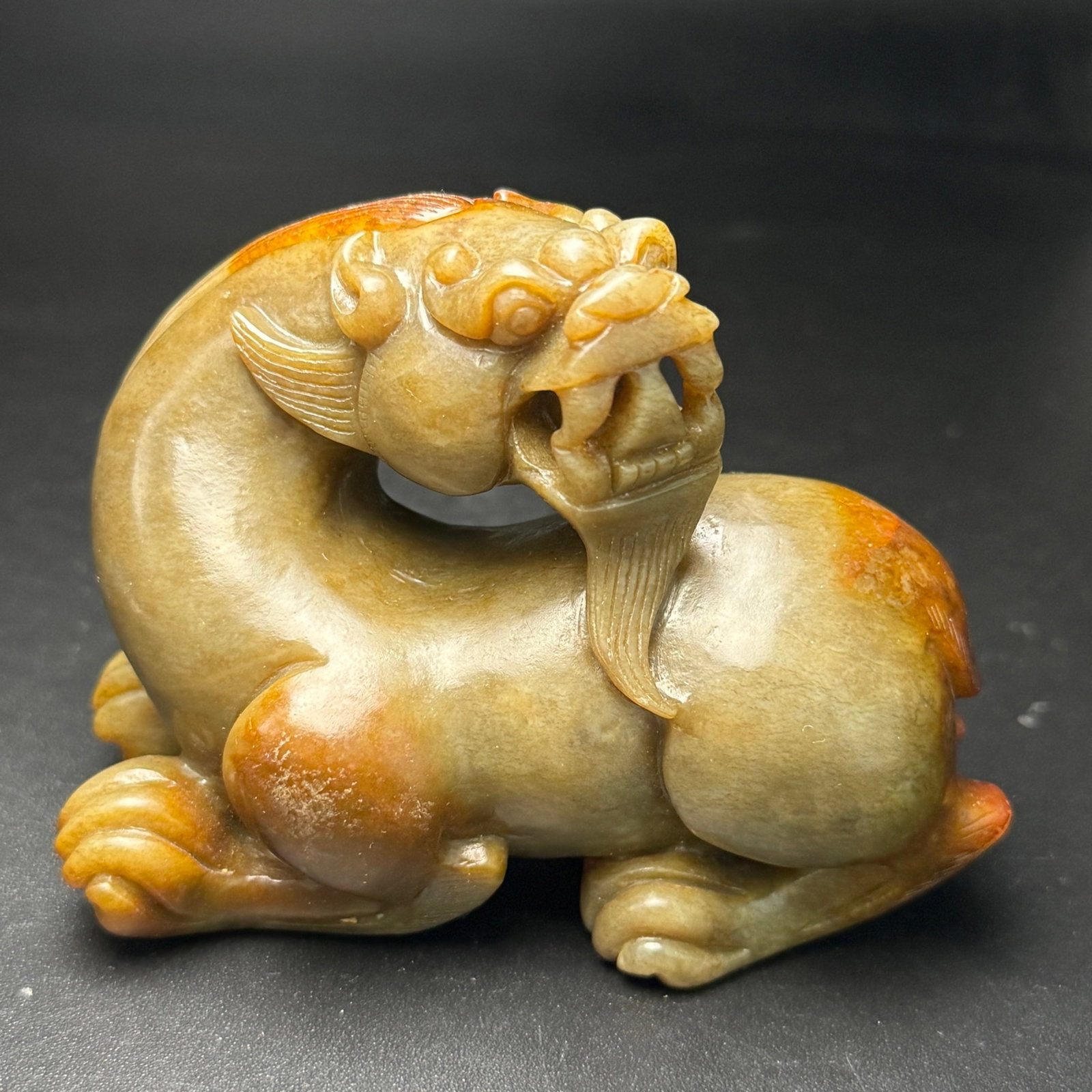 An Exquisite Archaic Jade Auspicious Beast Ornament: An Exquisite Archaic Jade Auspicious Beast Ornament,Ancient Time,China,Size:3.9inx3inx1.9in,Weight:434g 高古玉瑞兽摆件,中国远古时