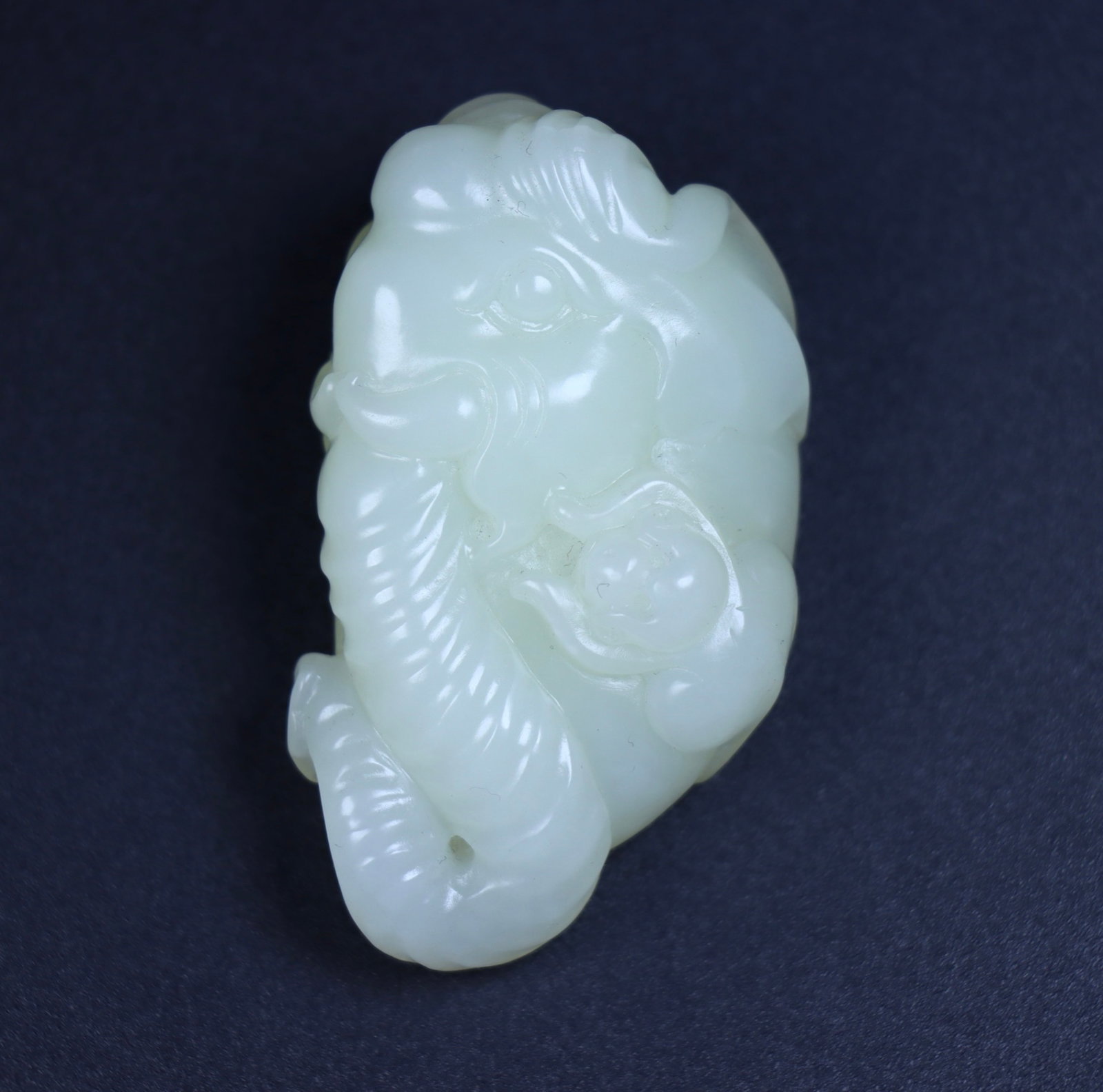 An Exquisite White Jade Elephant Ornament: An Exquisite White Jade Elephant Ornament,Qing Dynasty,China,Size:2.4inx1.4inx1in,Weight:66g 白玉象摆件,中国清代