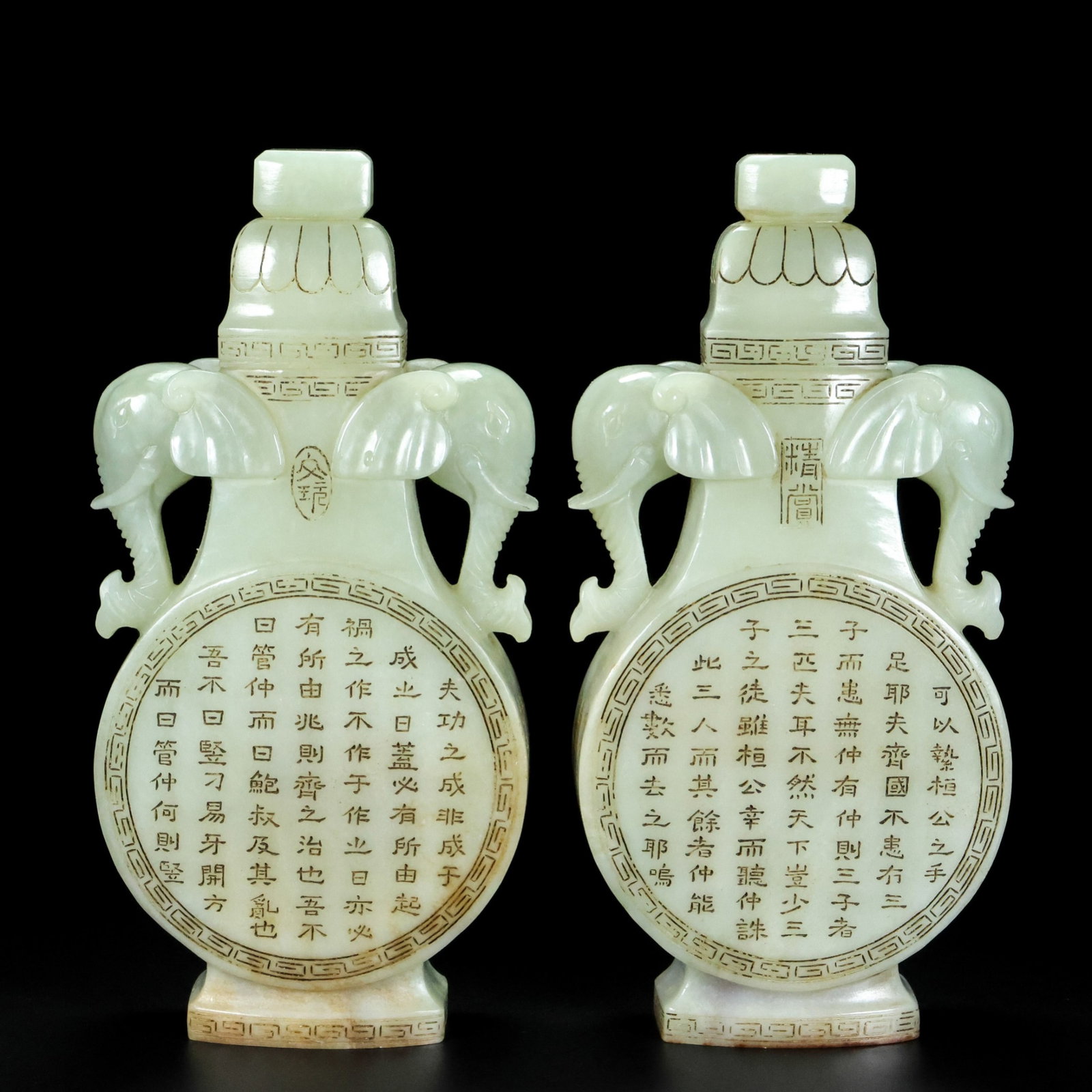 A Pair of Exquisite White Jade Elephant-Ears Vases,with poem: A Pair of Exquisite White Jade Elephant-Ears Vases,with poem,Qing Dynasty,China,Size:7.5inx3.9inx1.6in,Weight:947g 一对白玉象耳瓶,带诗文,