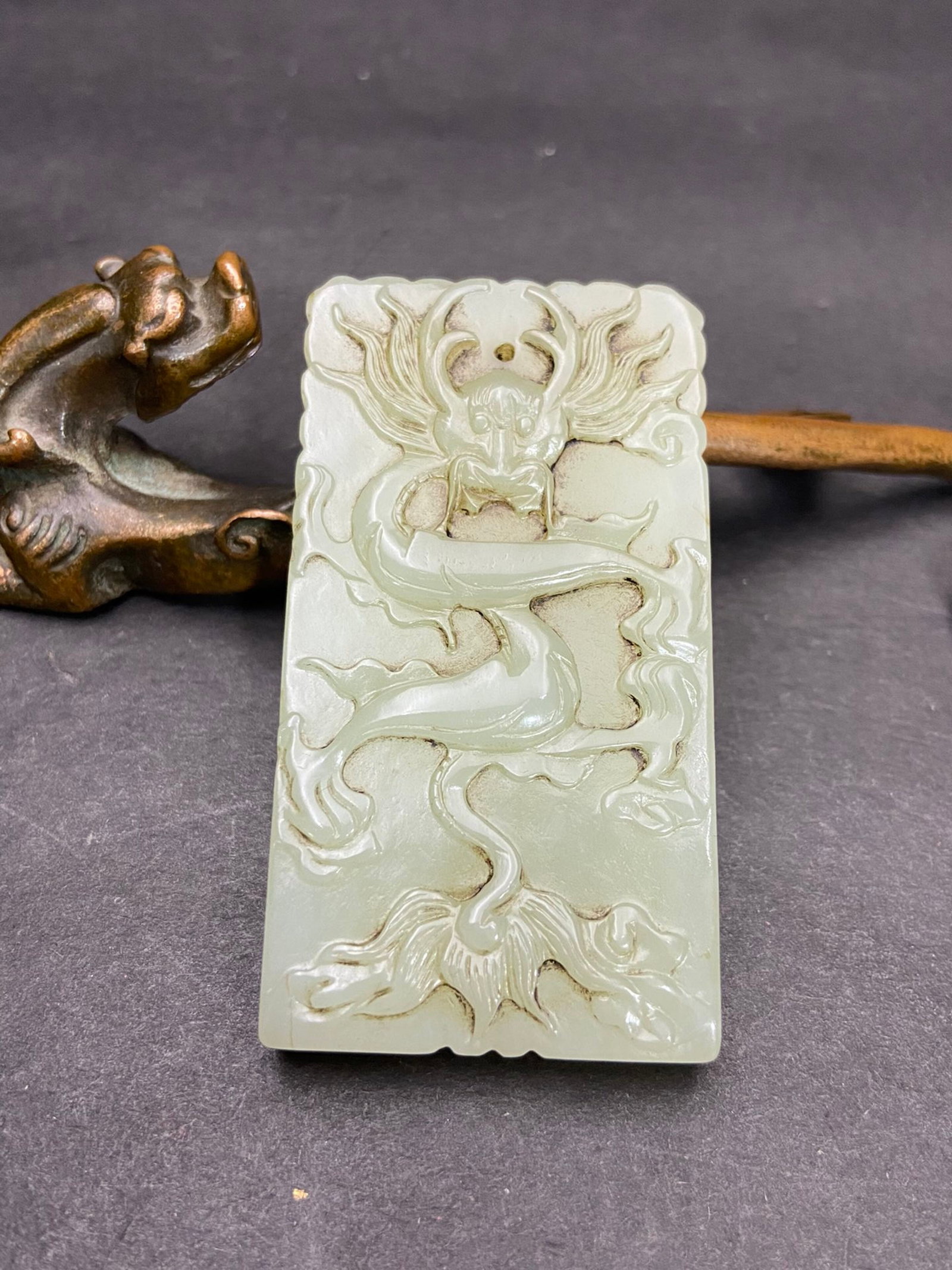 An Exquisite White Jade Dragon Pattern Pendant,with poem: An Exquisite White Jade Dragon Pattern Pendant,with poem,Qing Dynasty,China,Size:2.7inx1.4inx0.4in,Weight:54g 白玉龙纹挂件,带诗文,中国