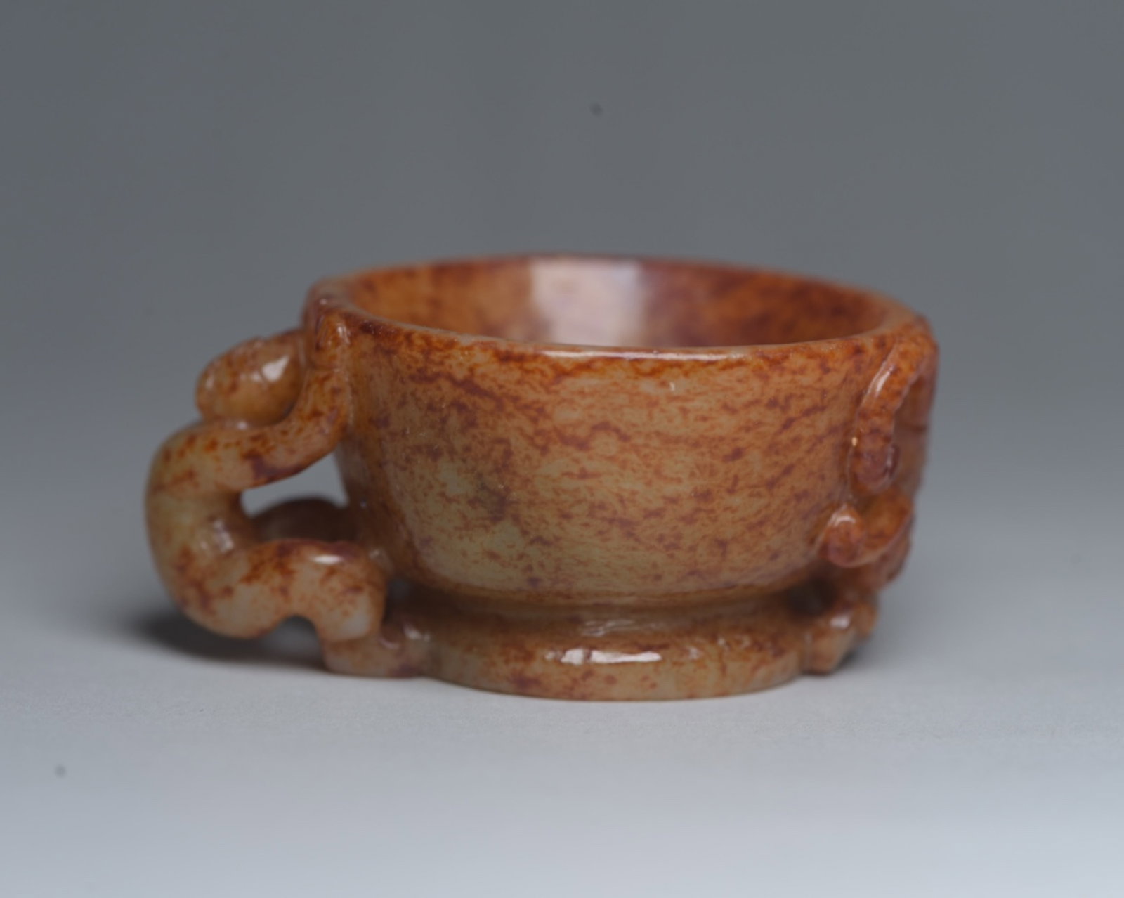 An Exquisite White Jade Sheep Pattern Cup: An Exquisite White Jade Sheep Pattern Cup,Qing Dynasty,China,Size:2.5inx1.9inx1.2in,Weight:93g 白玉羊纹杯子,中国清代